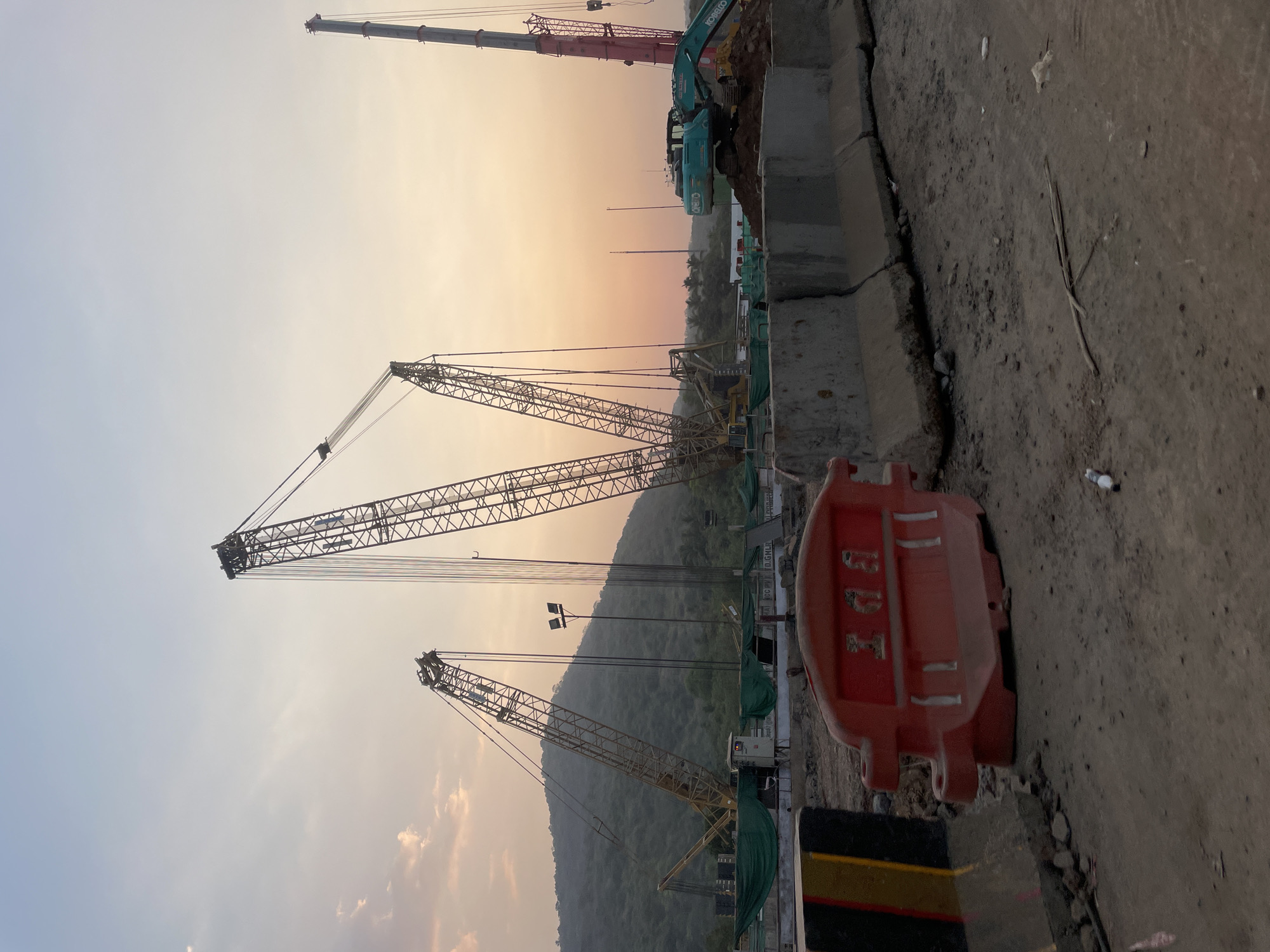 Mumbai construction site photographed during sunset hours
