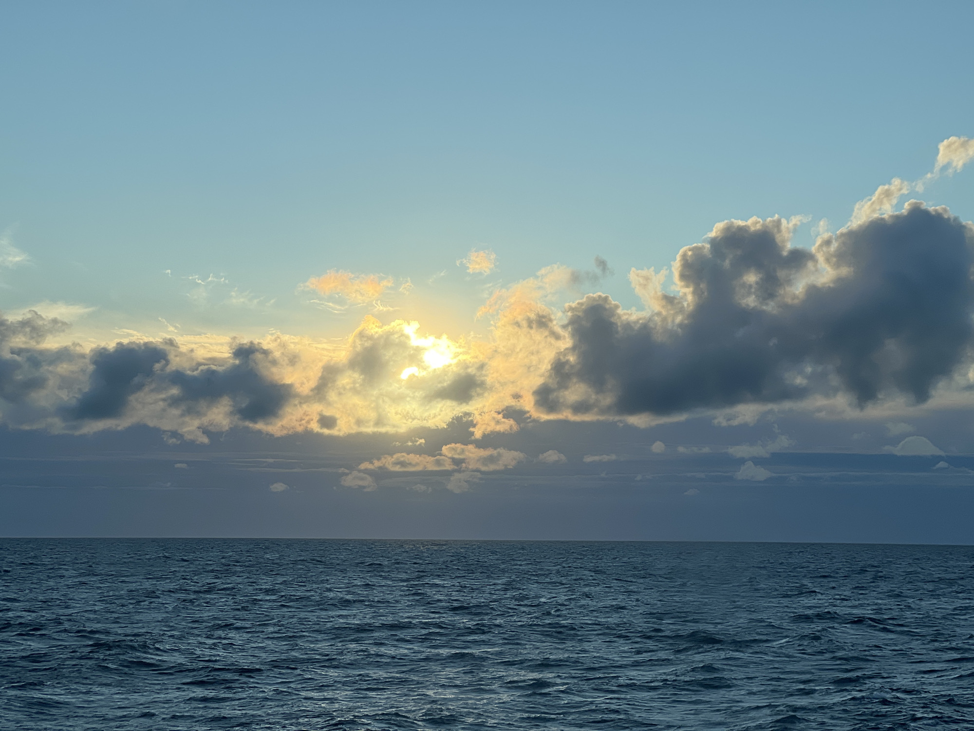 Open Baltic Sea under a wide, cloud-scattered sky