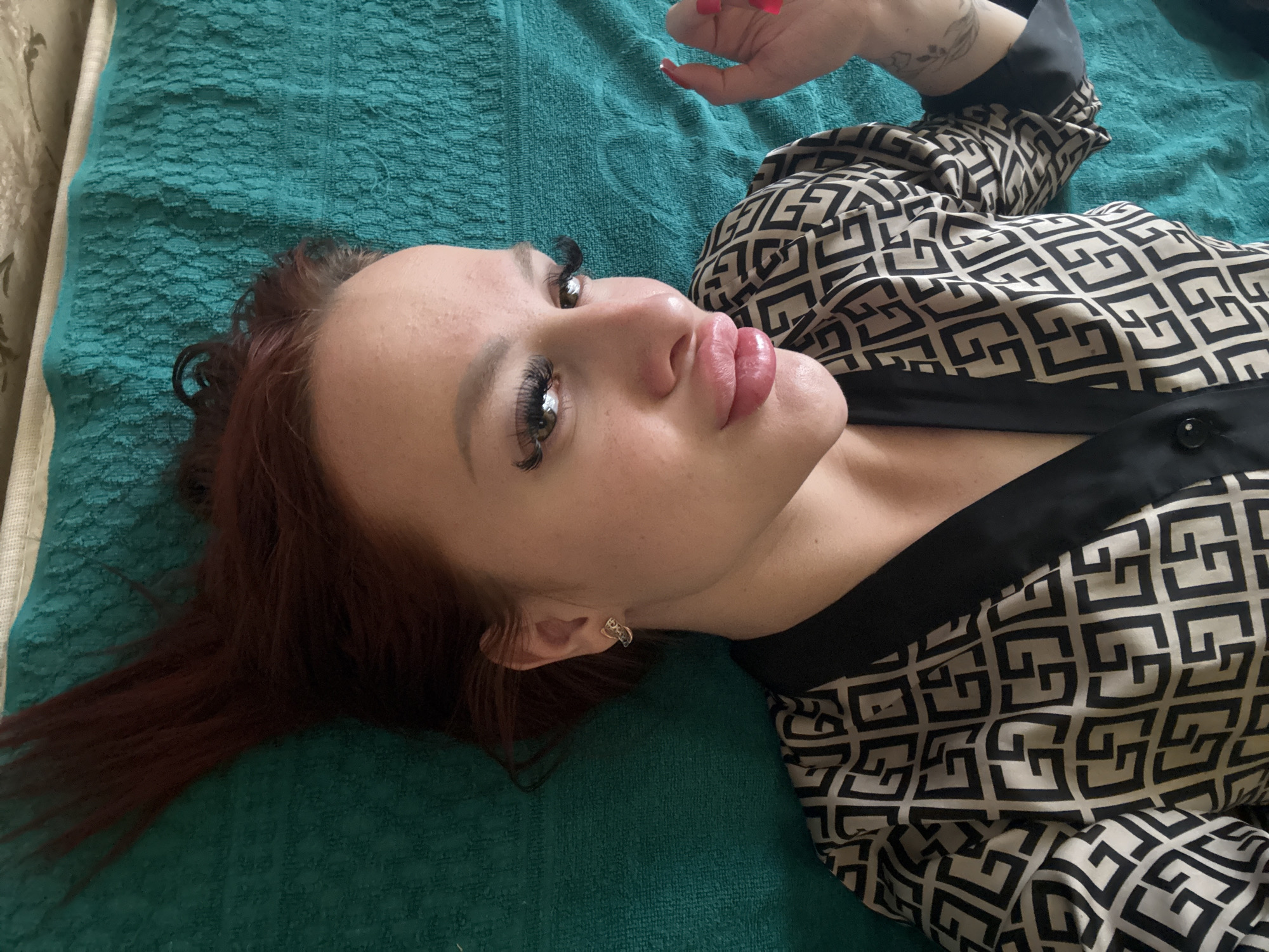 Woman resting on green surface in Simferopol
