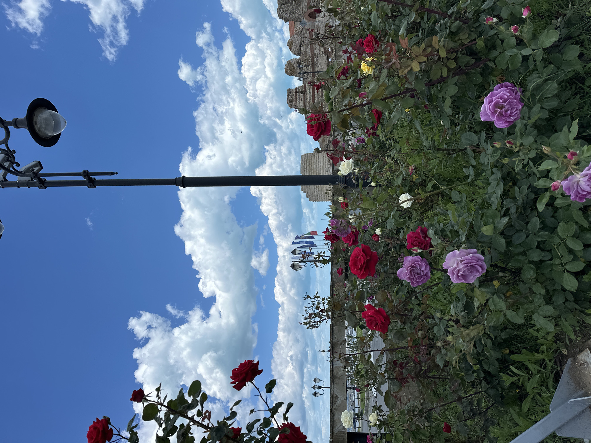 Tourist captures scenic landmarks in historic Nesebar, Bulgaria