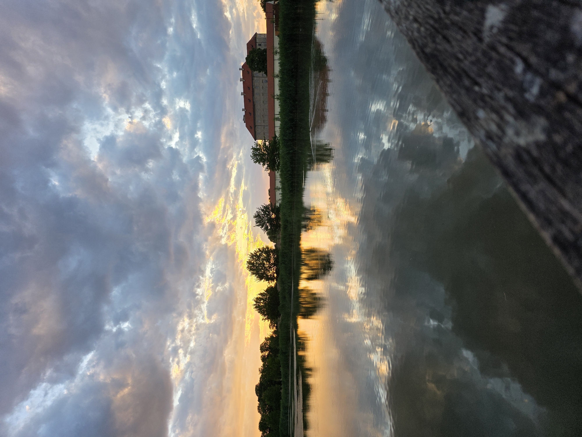 Golden hour scenes with swans, historic buildings, and dramatic skies