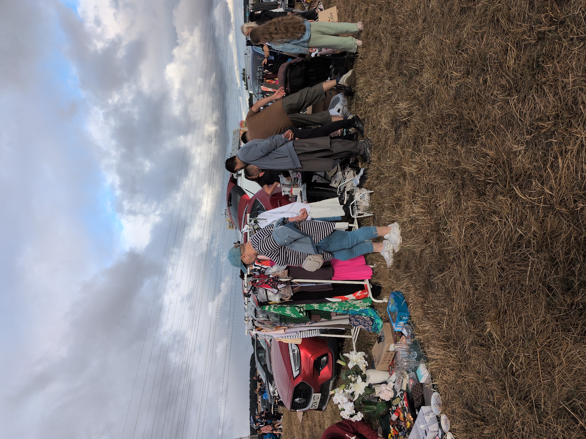Car boot sale browsing in South Staffordshire on a cloudy morning