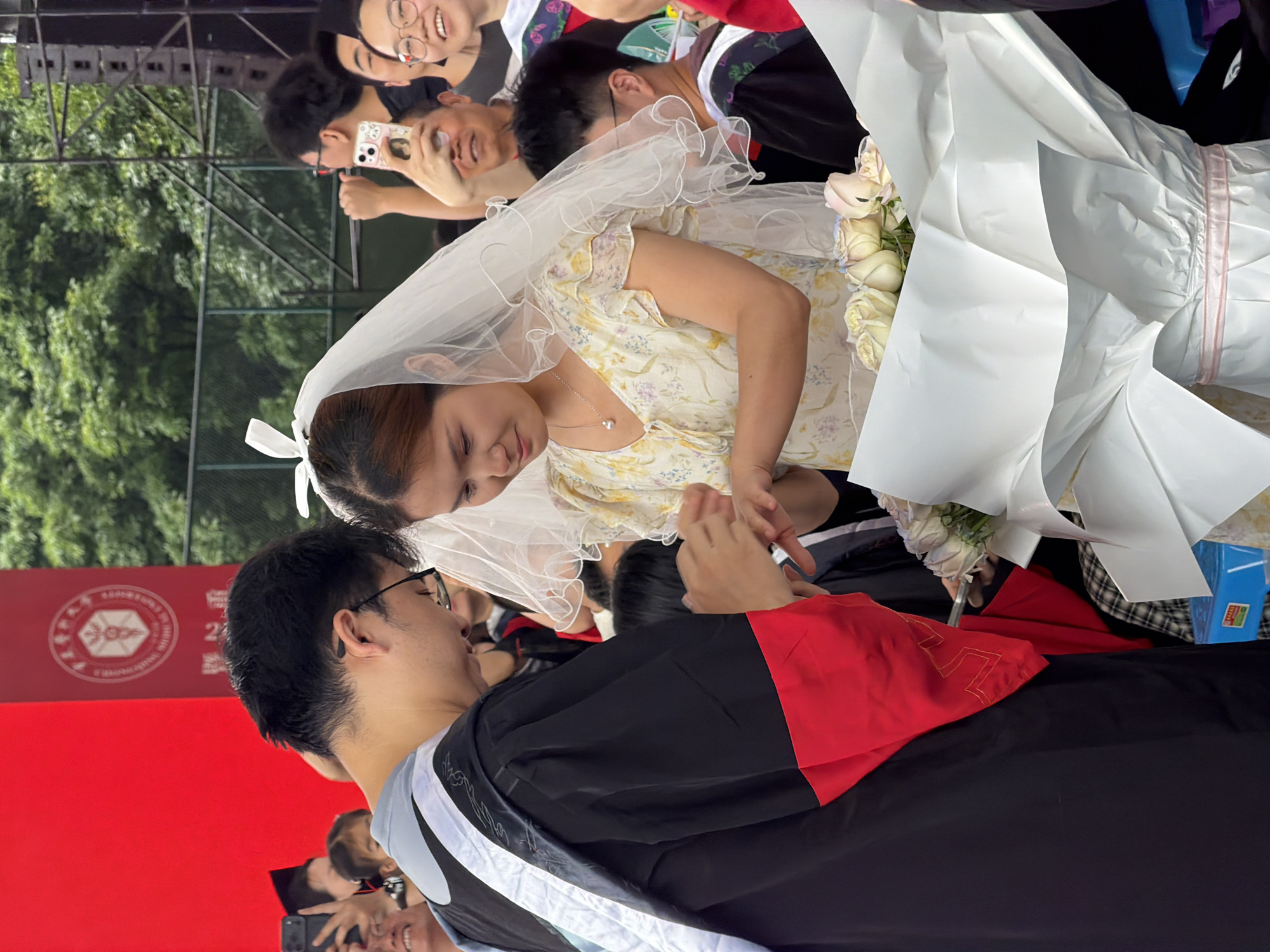 Graduation ceremony in Chongqing doubles as celebration and proposal