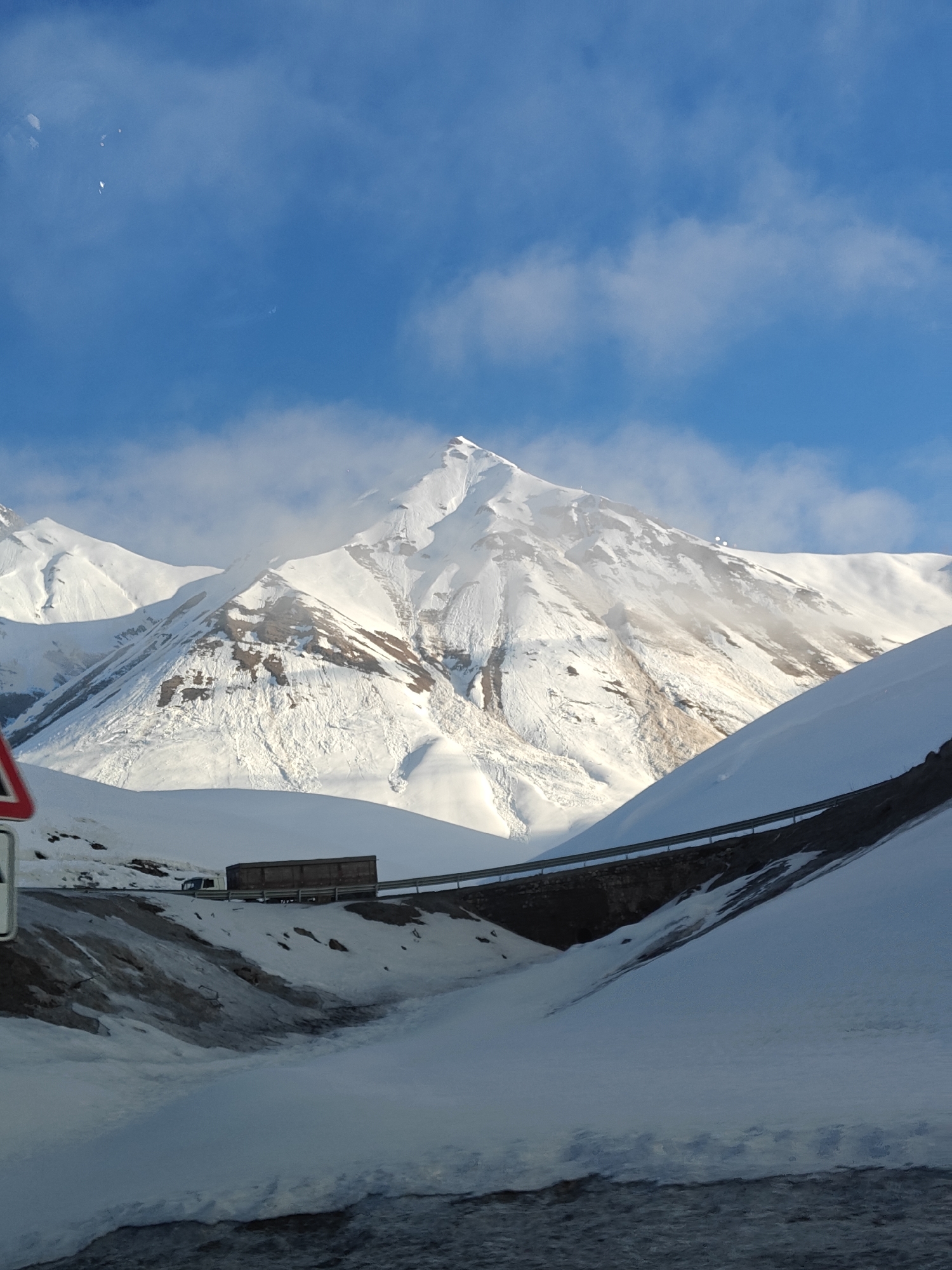 Snow-covered mountains documented in Gudauri, Georgia early morning