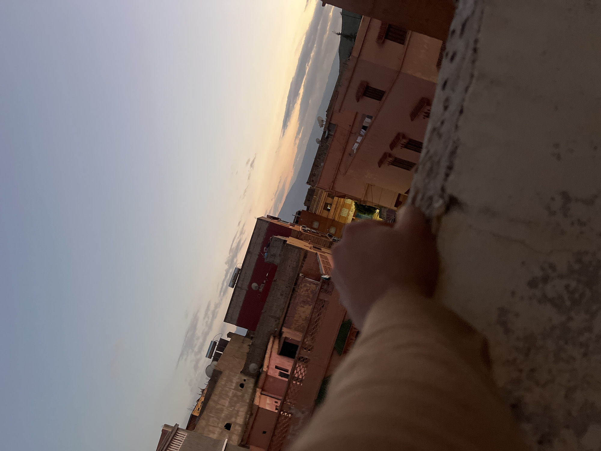 Evening life and construction documented in Ouaouizert, Morocco