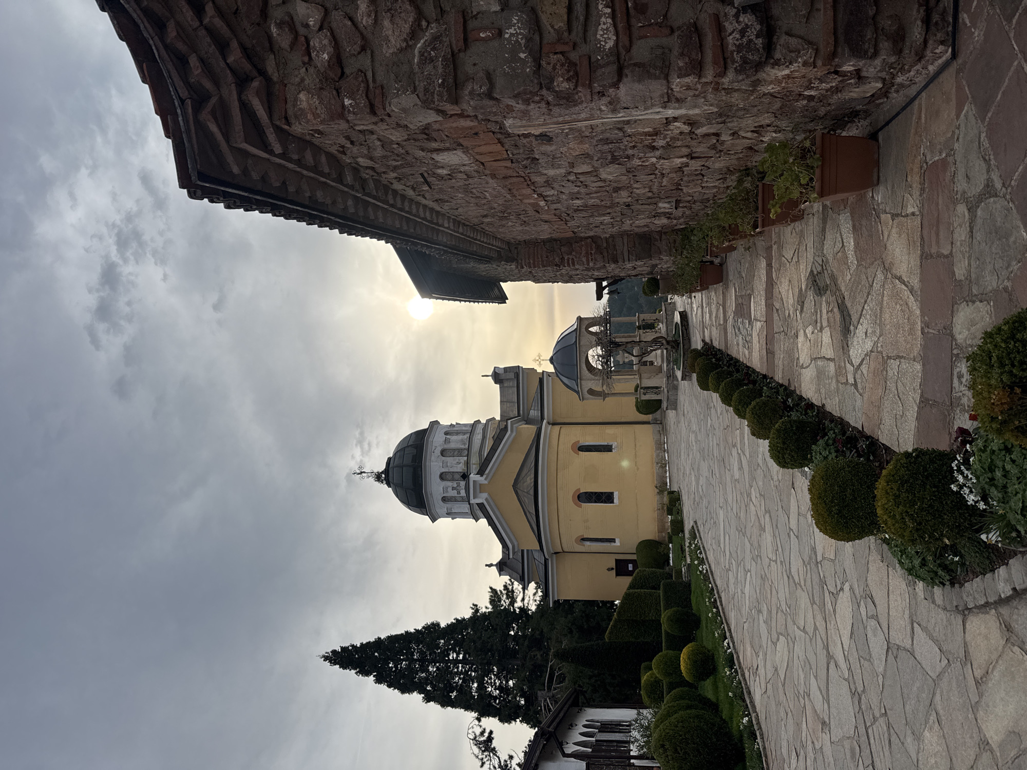 Tourist documents historic Sofia churches during afternoon visit