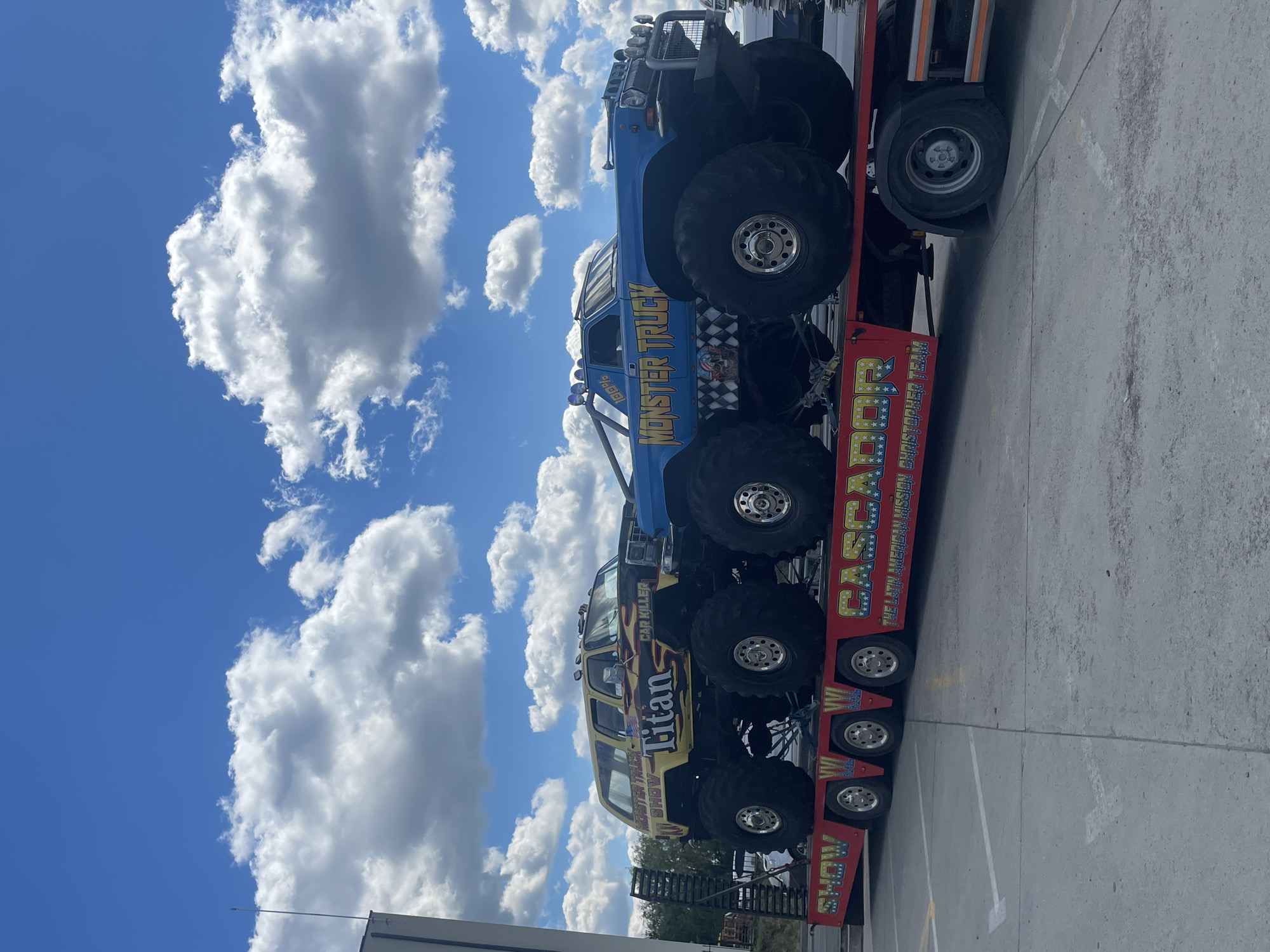 Monster trucks transported on flatbed trailer in Oradea, Romania