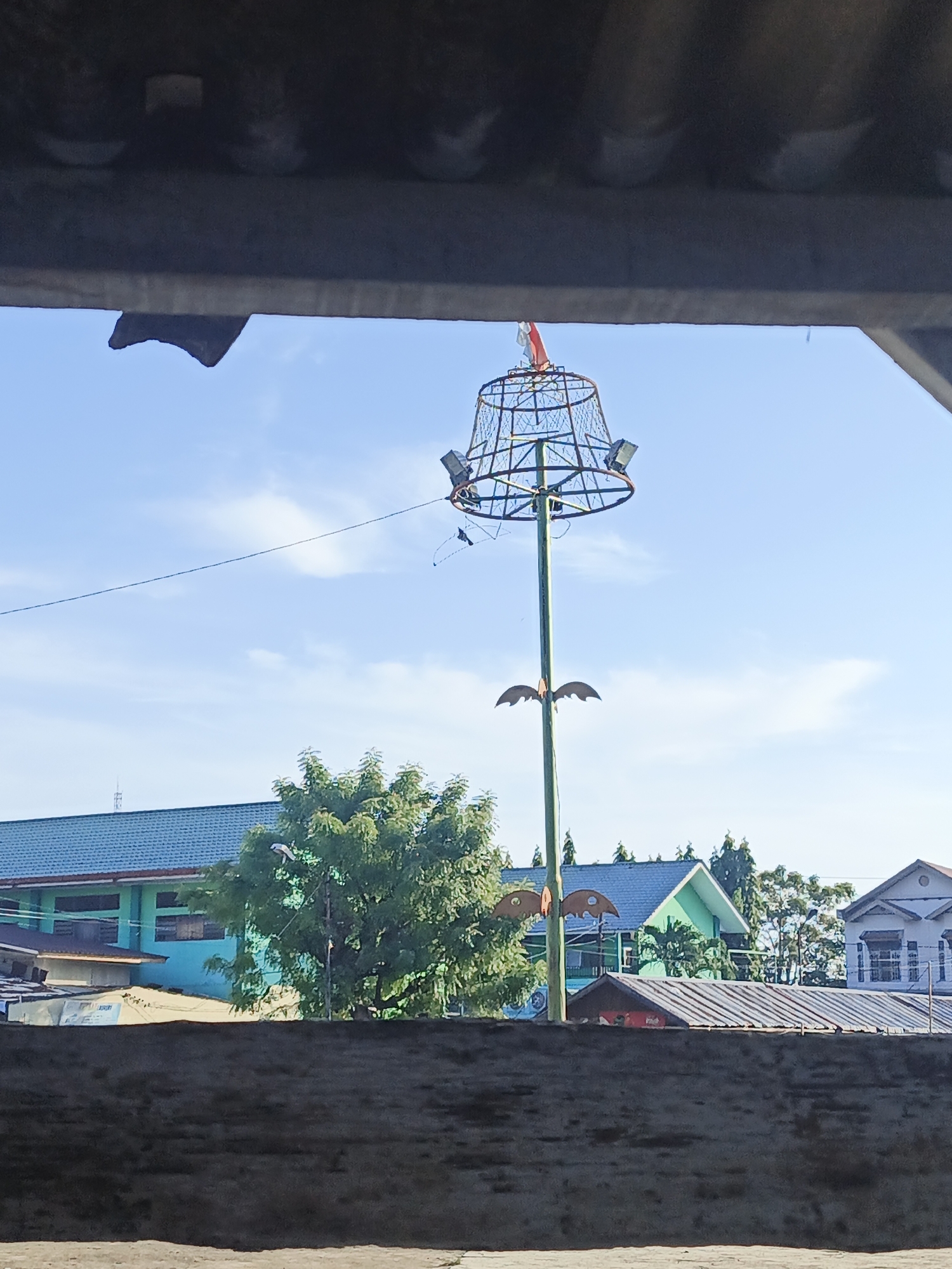 Decorative bat-themed pole structure spotted in Lhokseumawe, Indonesia