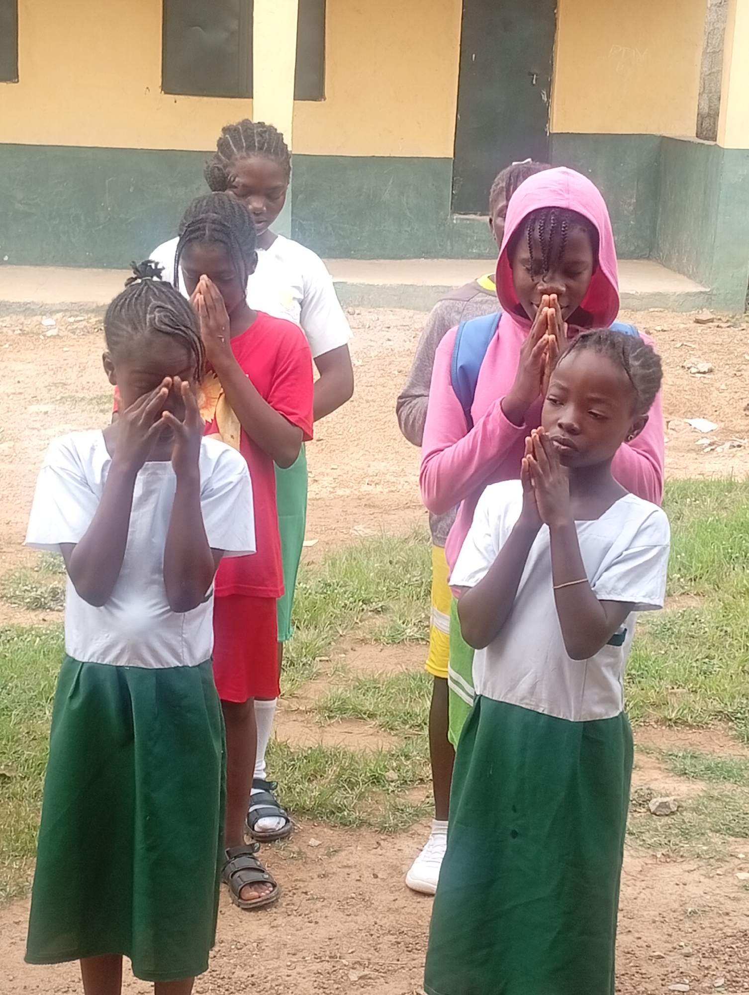 School children gather in Narayi Nigeria schoolyard morning