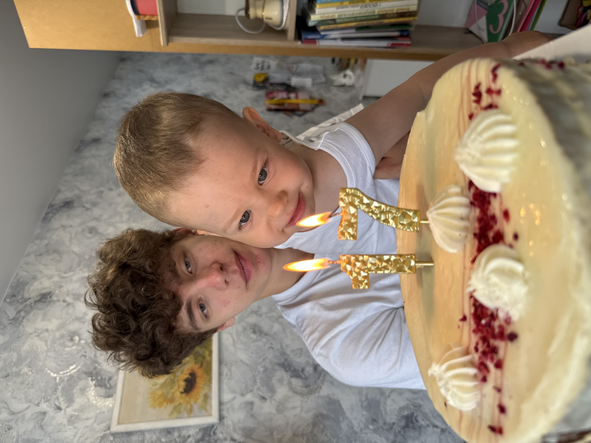 Toddler and adult pose for photo in Rusanovo