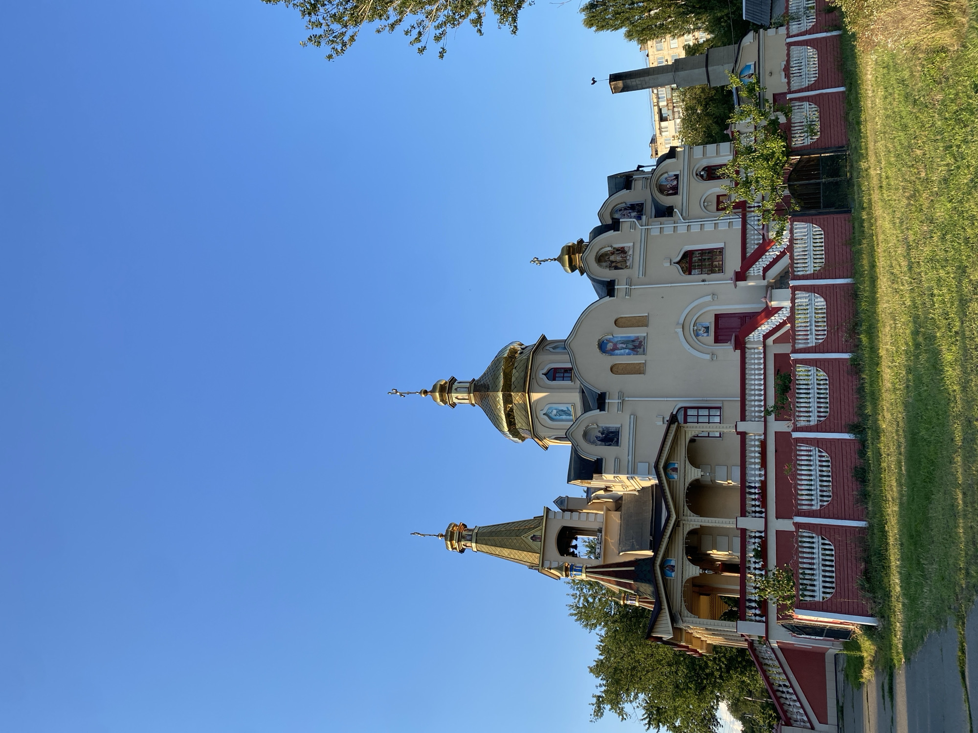 Orthodox church and city streets in an Eastern European neighborhood