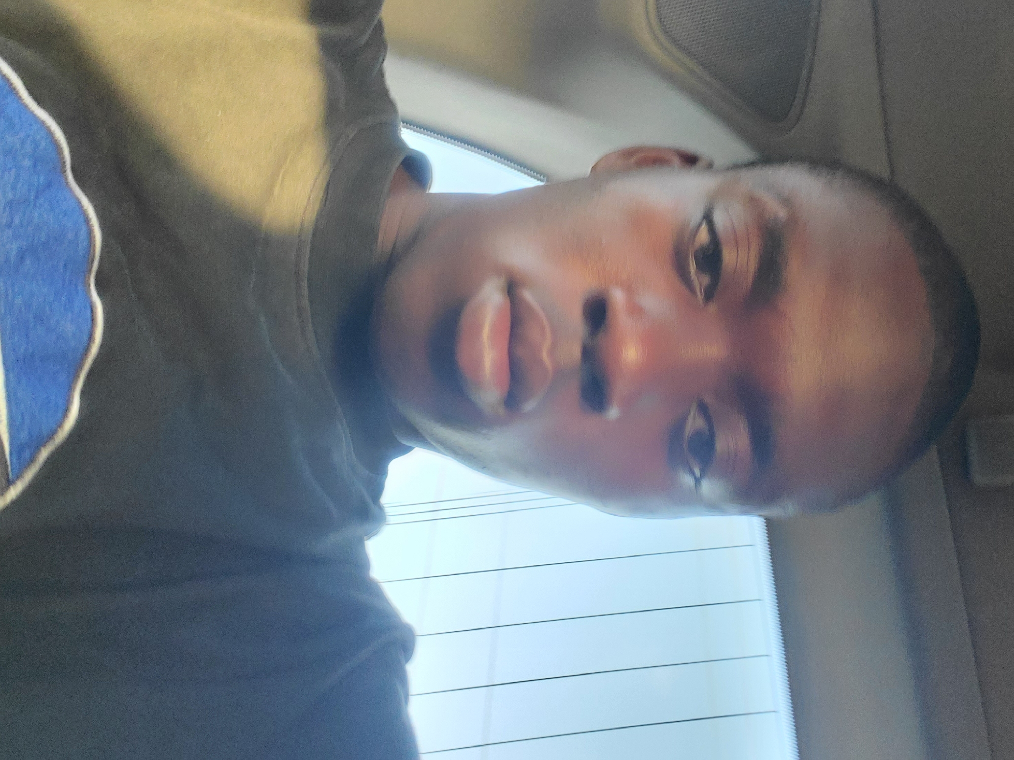 Man takes selfie in car in Onitsha, Nigeria
