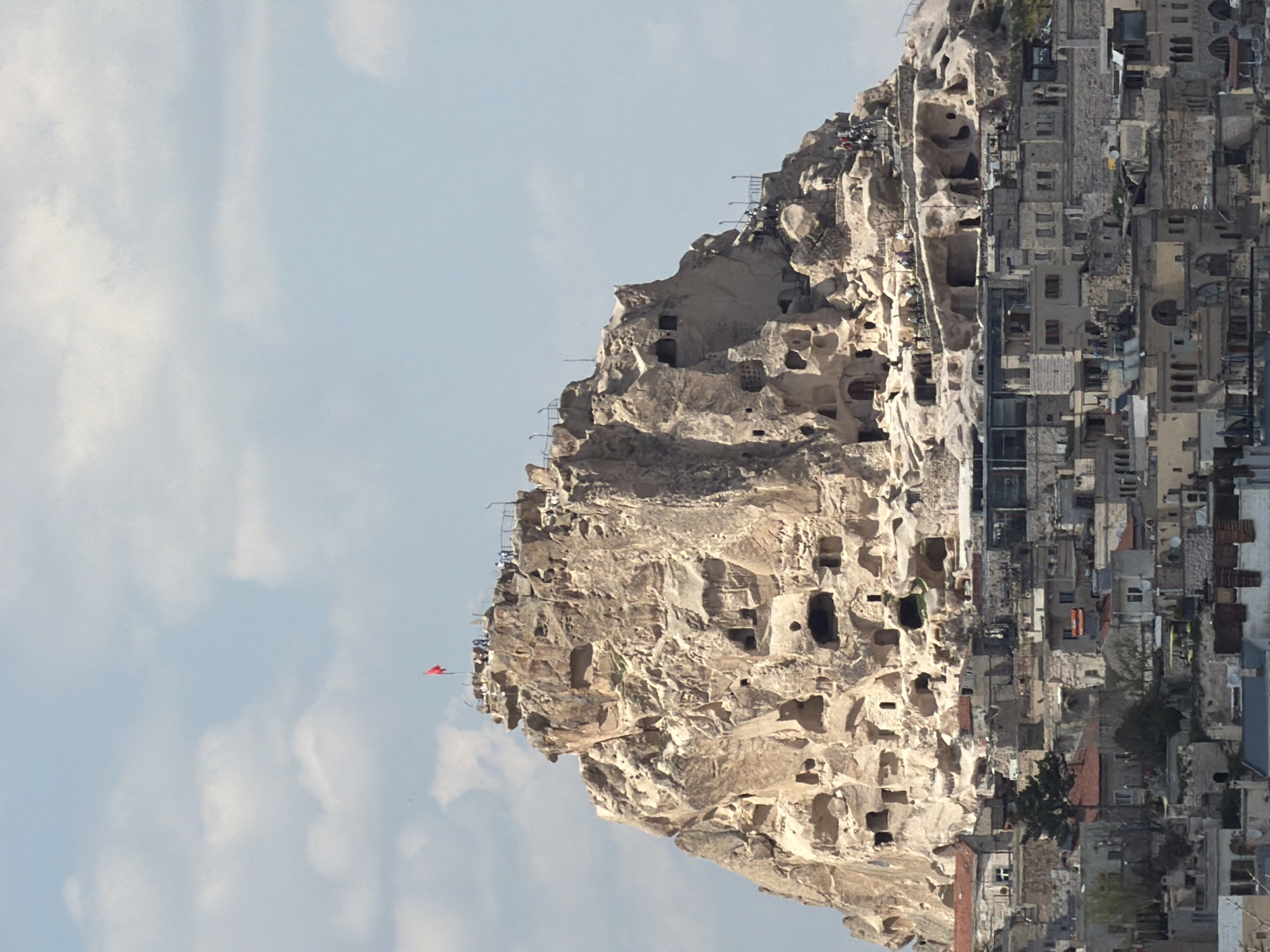 Tourist captures Cappadocia's iconic rock formations and local pigeons