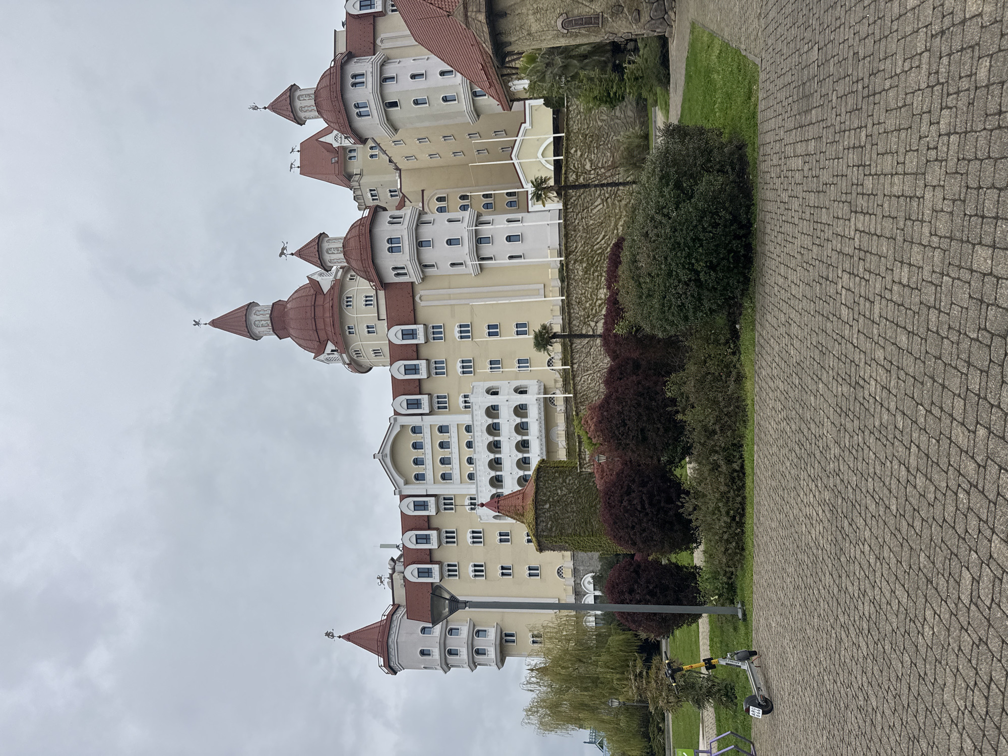 Castle-like building photographed in Sirius, Russia under overcast skies