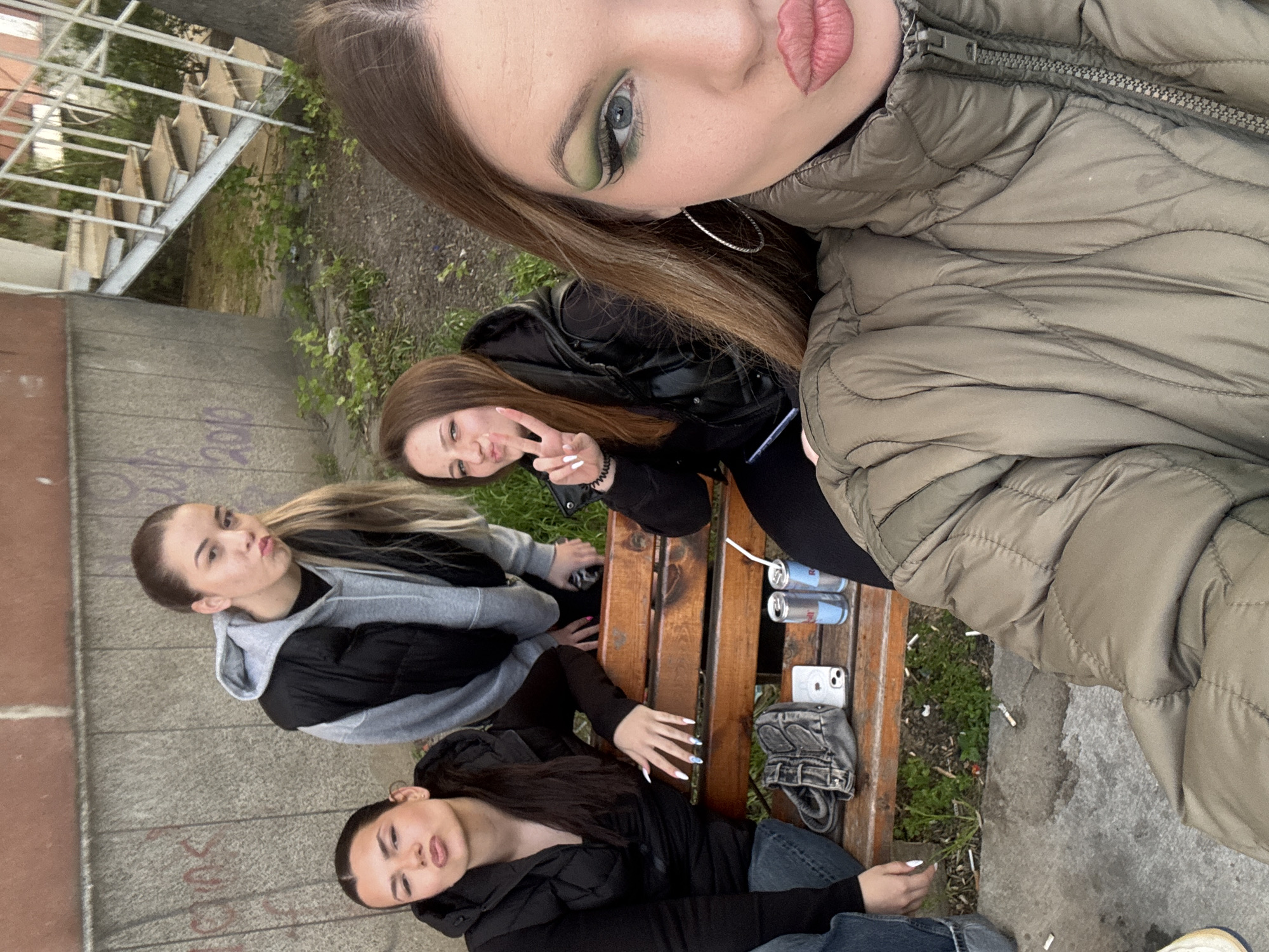 Young women take group selfies outdoors in Plovdiv
