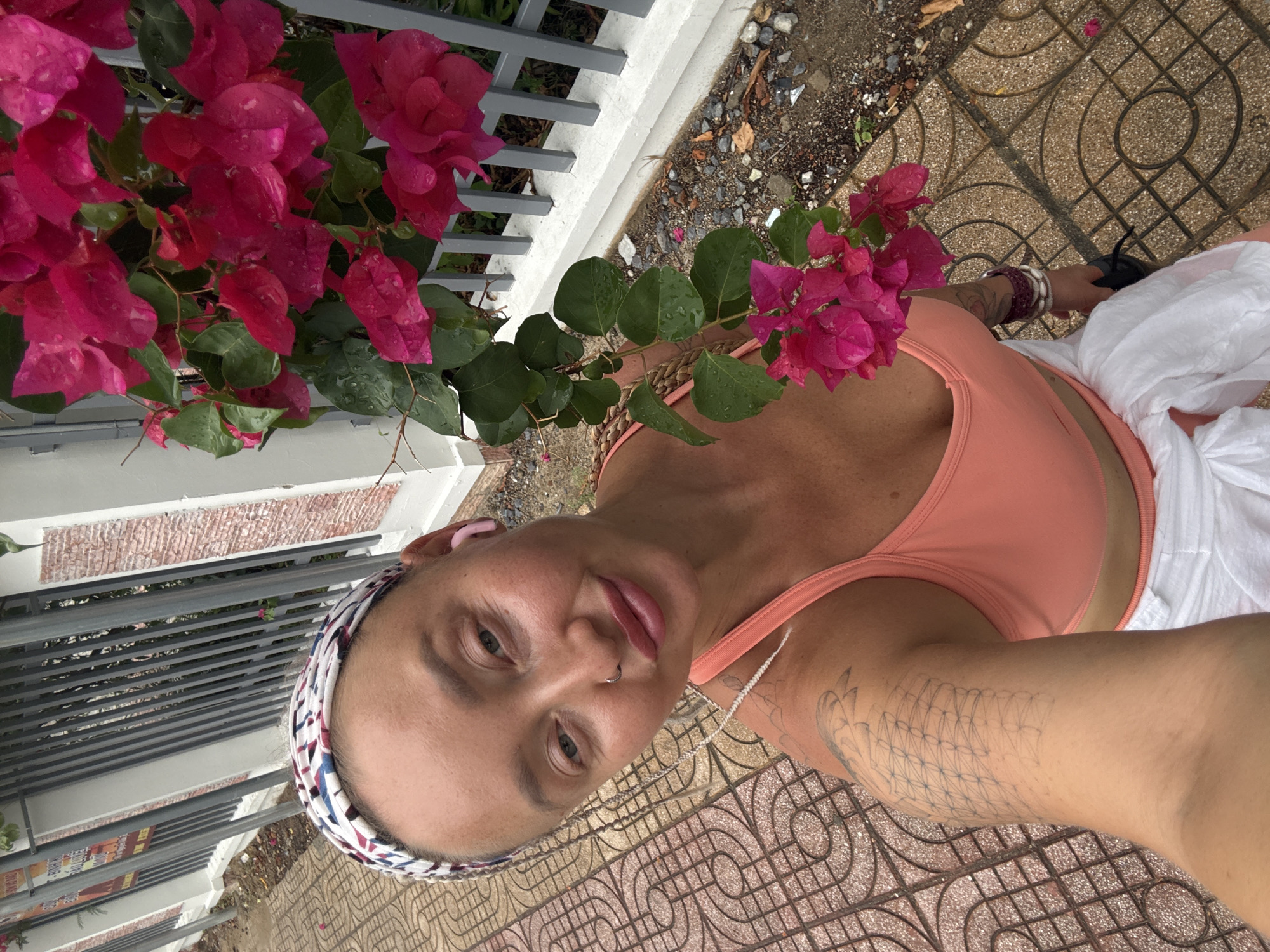 Bougainvillea and street food on a Nha Trang sidewalk