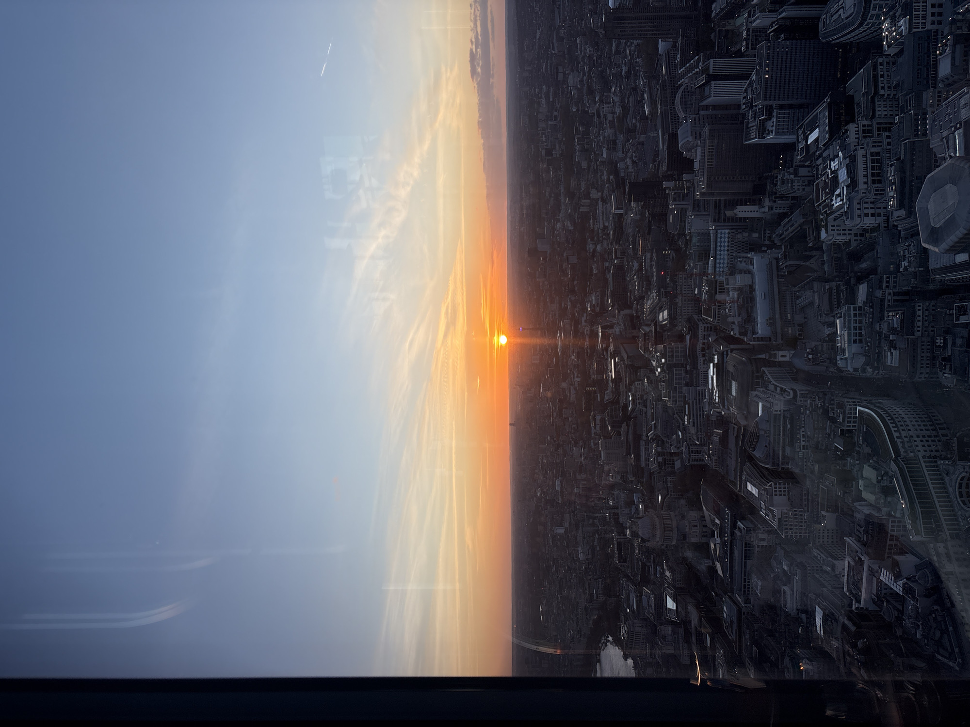 London rooftop venue captures sunset cityscape during evening hours