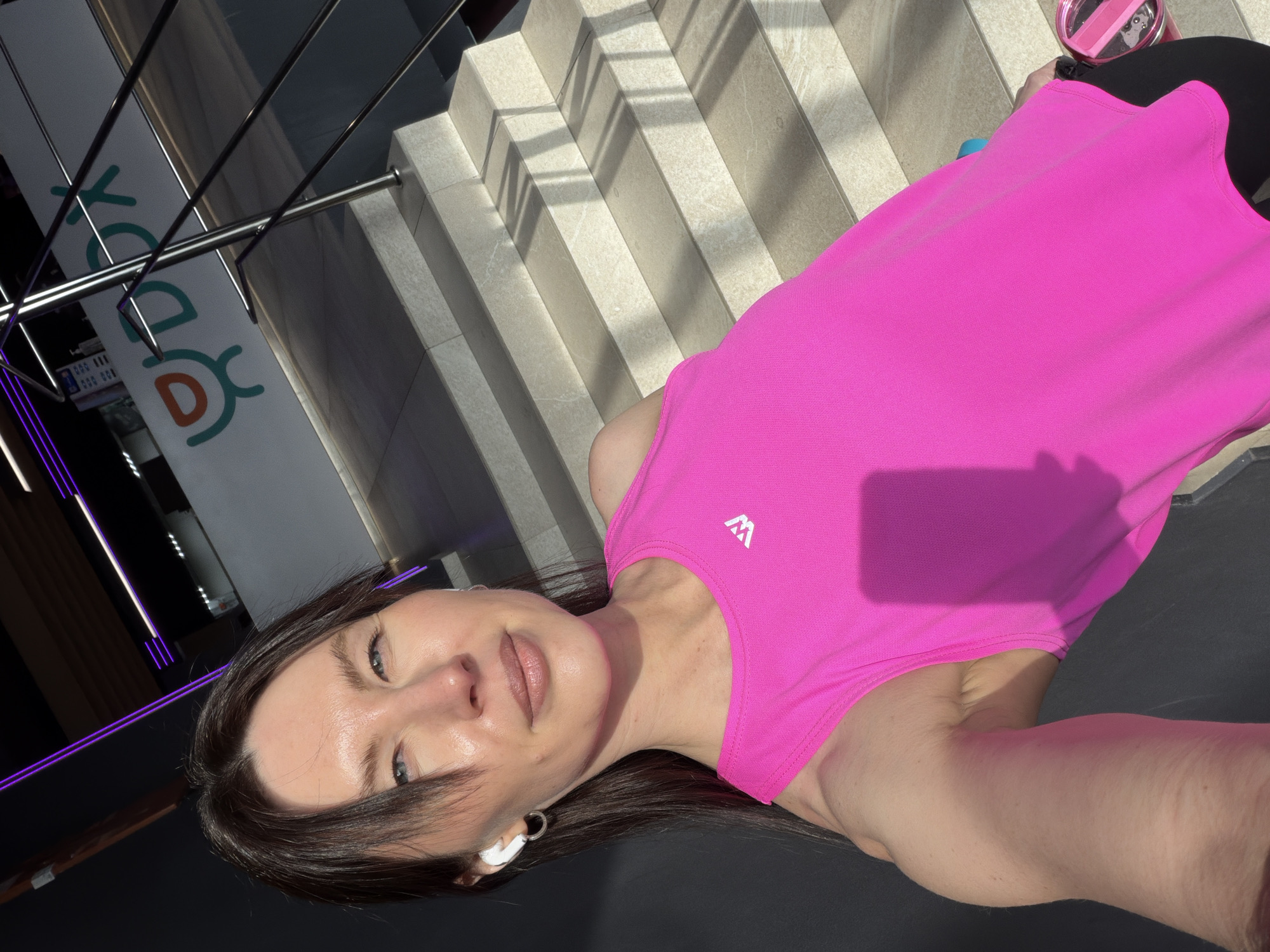 Woman takes selfie in pink top in Perm, Russia