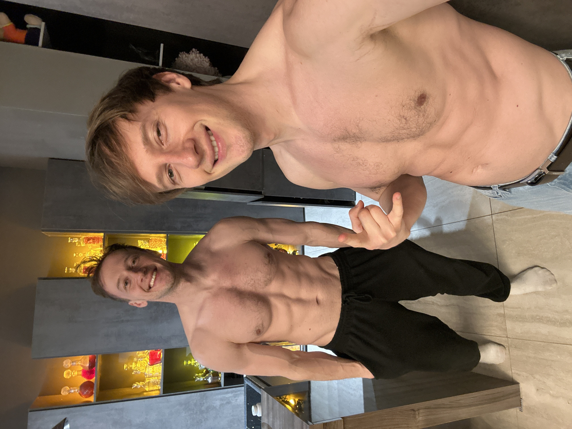 Two men photographed with bottles in Kursk home