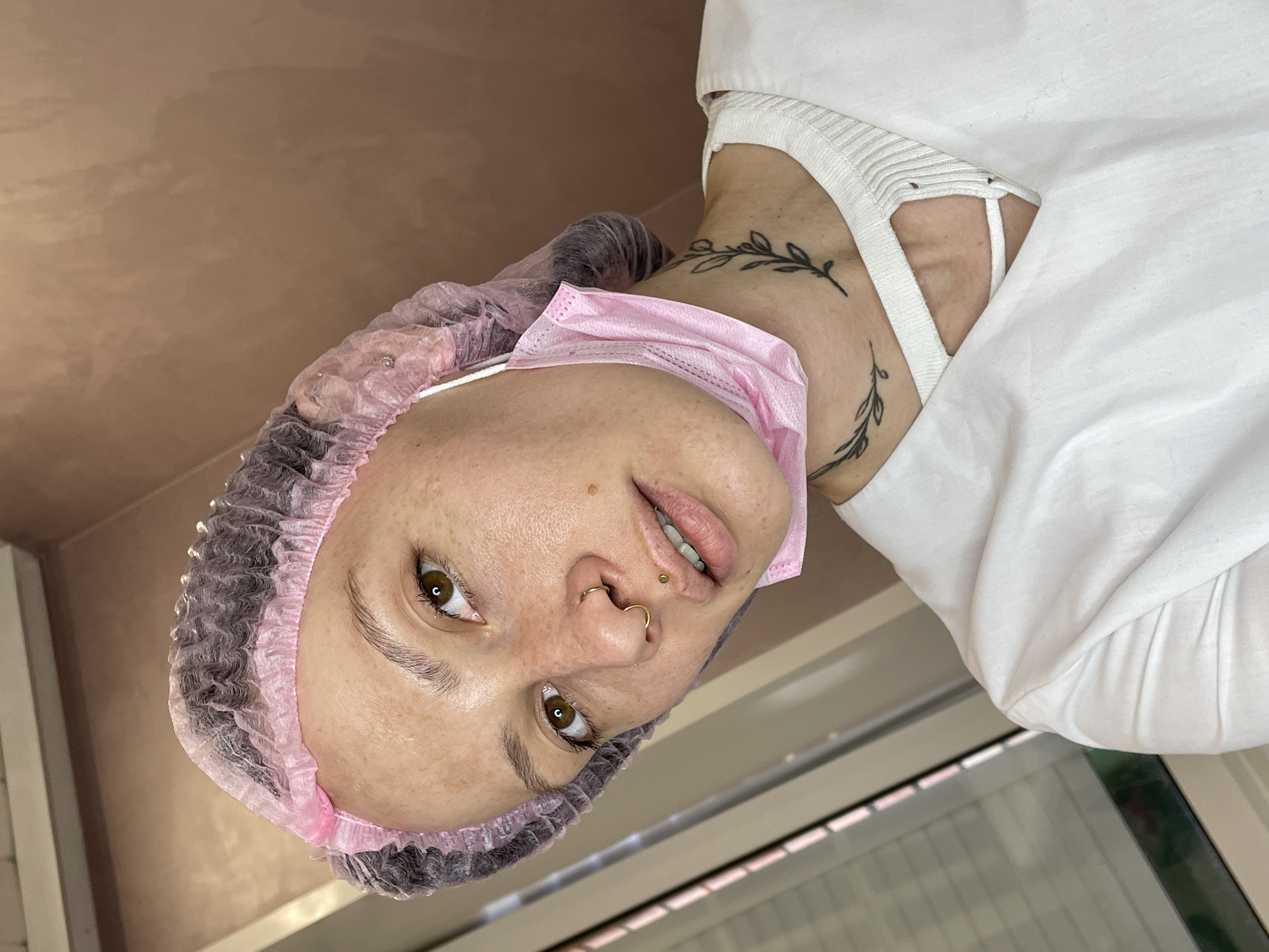 Woman in surgical attire observed in Izhevsk medical setting