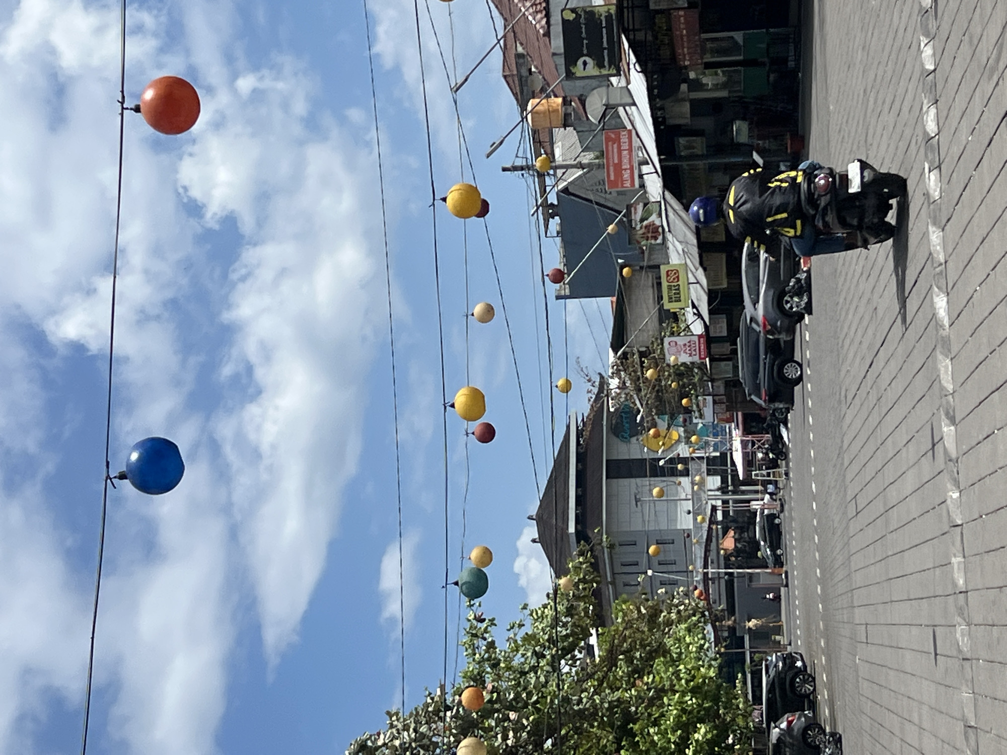 Kuta street traffic on a sunny Bali afternoon