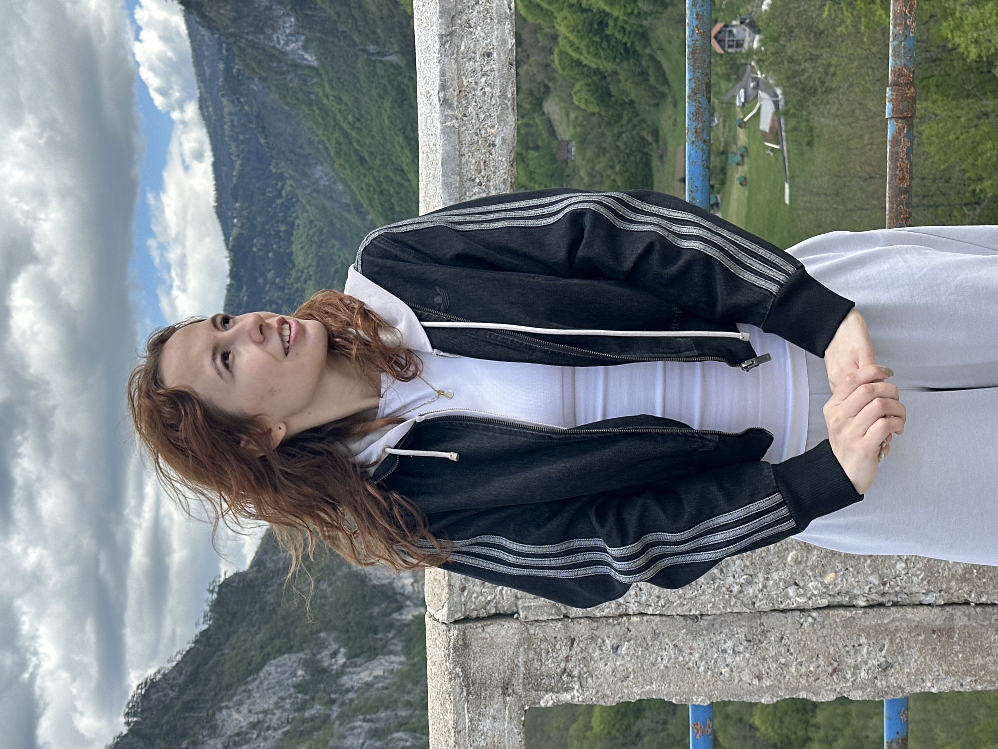 Tourist photographs herself at Montenegro's Tara River Canyon viewpoint