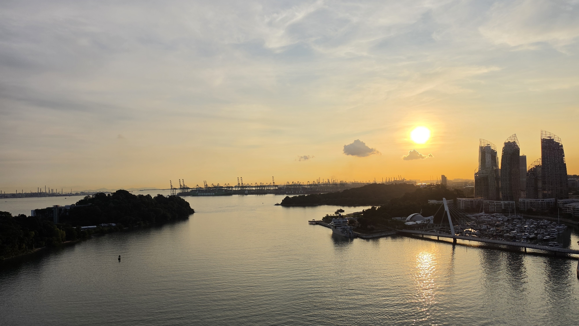 Sentosa cable car and Singapore waterfront at golden hour
