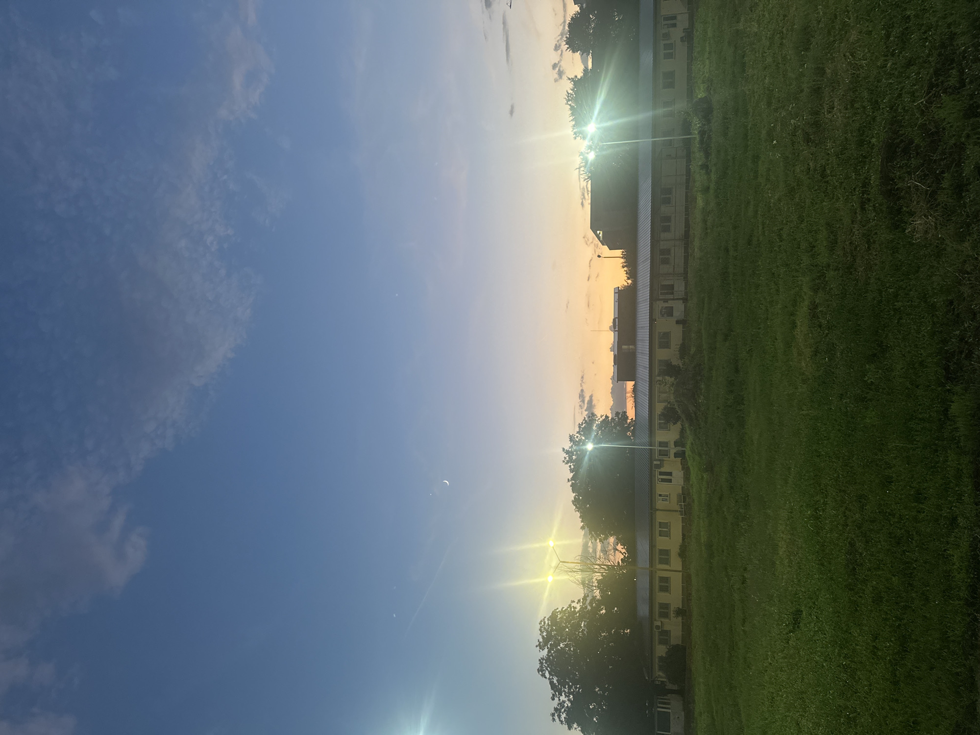Sunset fading to crescent moon over Timișoara