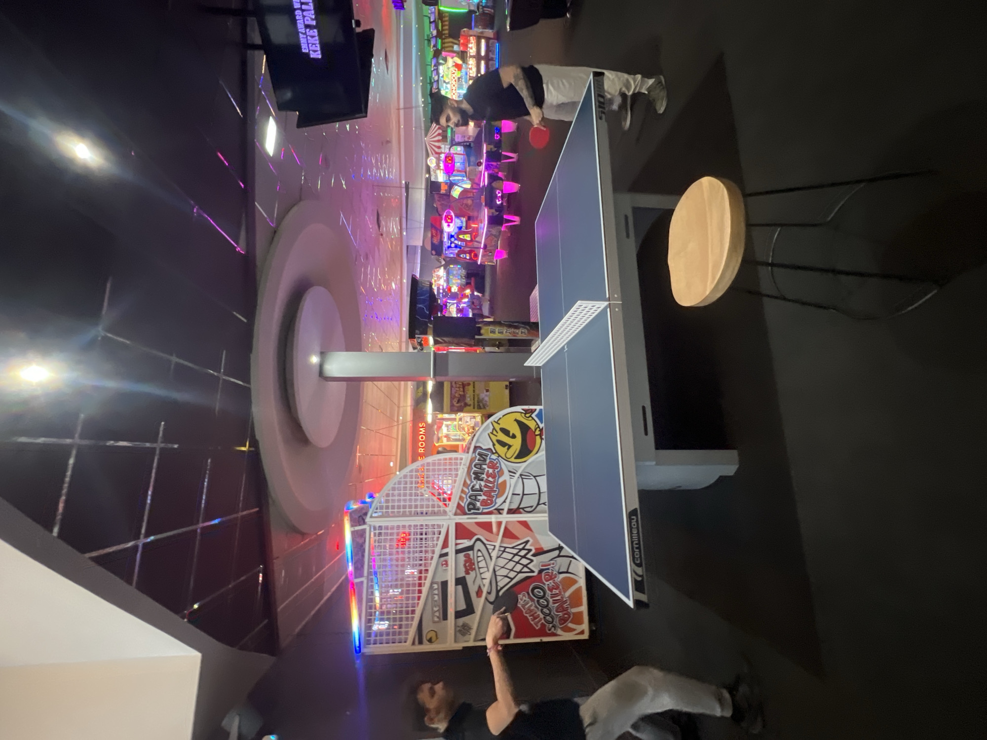 Ping pong players at Bristol arcade entertainment center