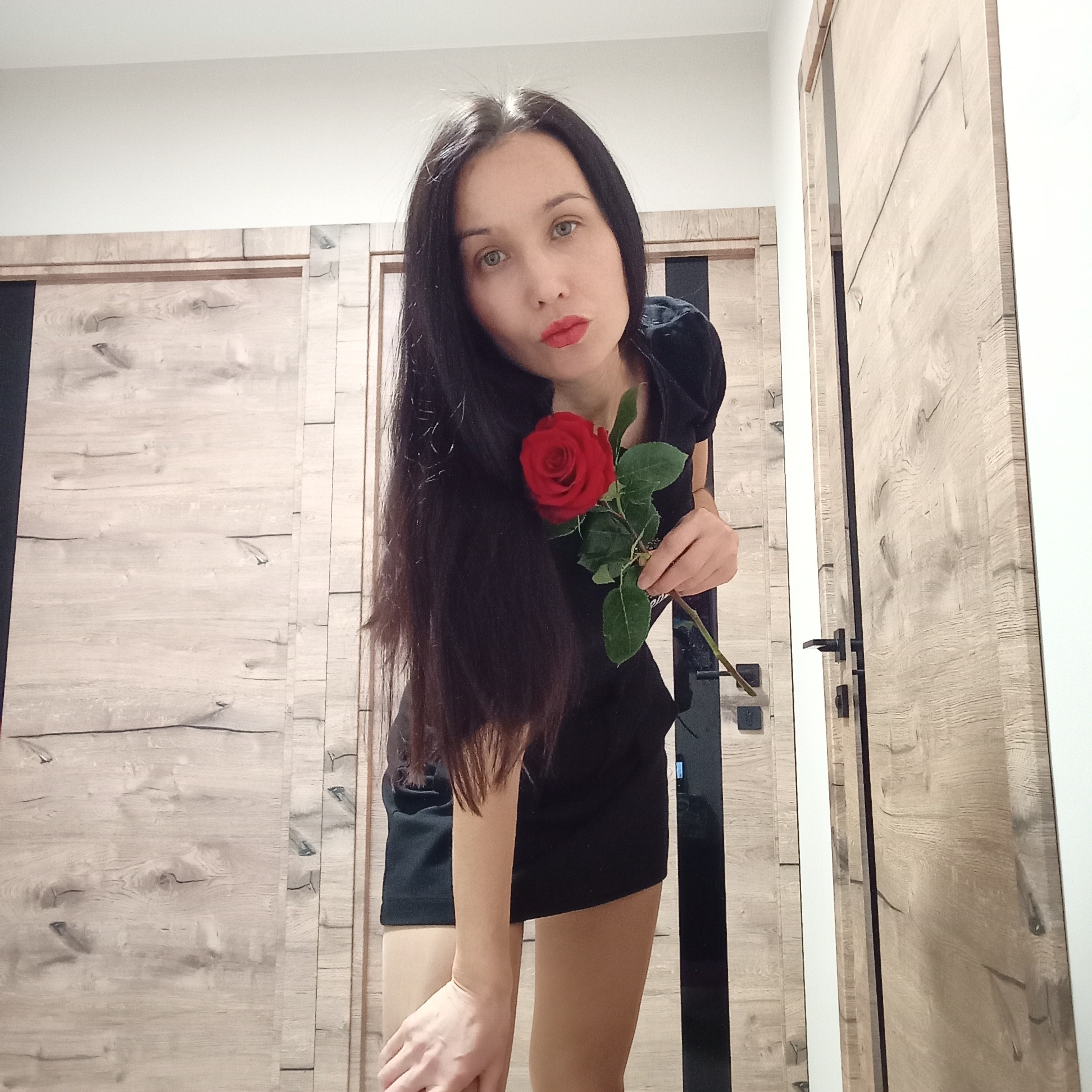 Woman photographed twice indoors in Pervomaysky, Russia