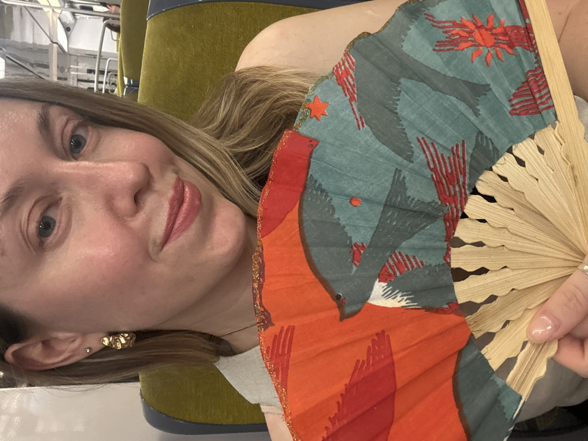 Colorful folding fan selfie in Gentilly, Paris suburbs.