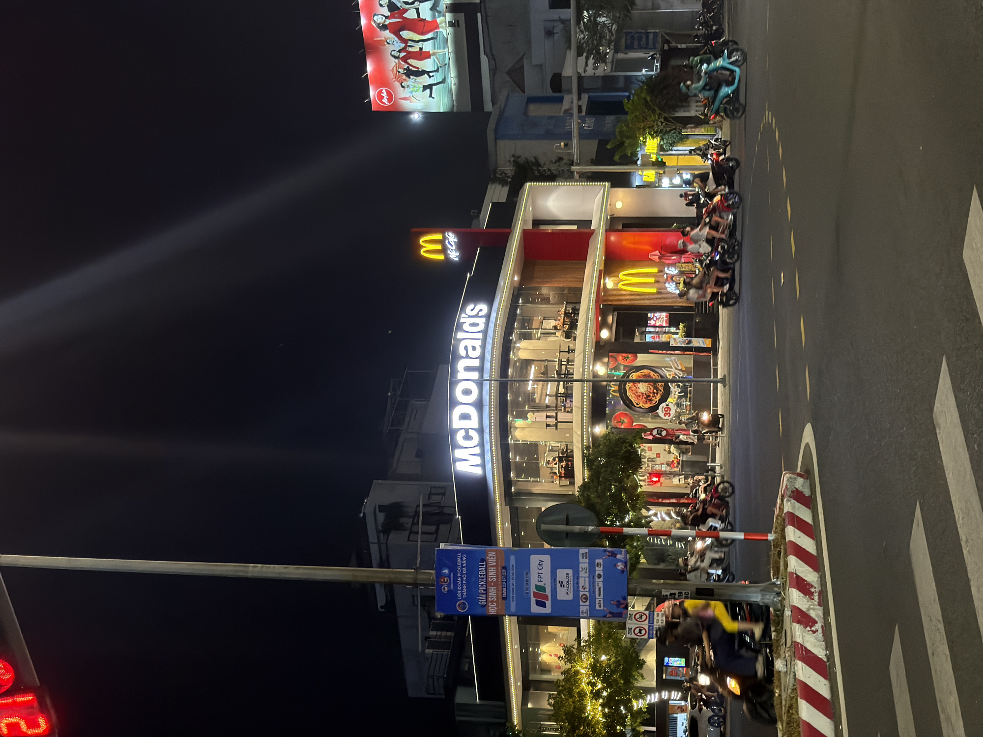 Dragon Bridge district alive with lights on a Da Nang night