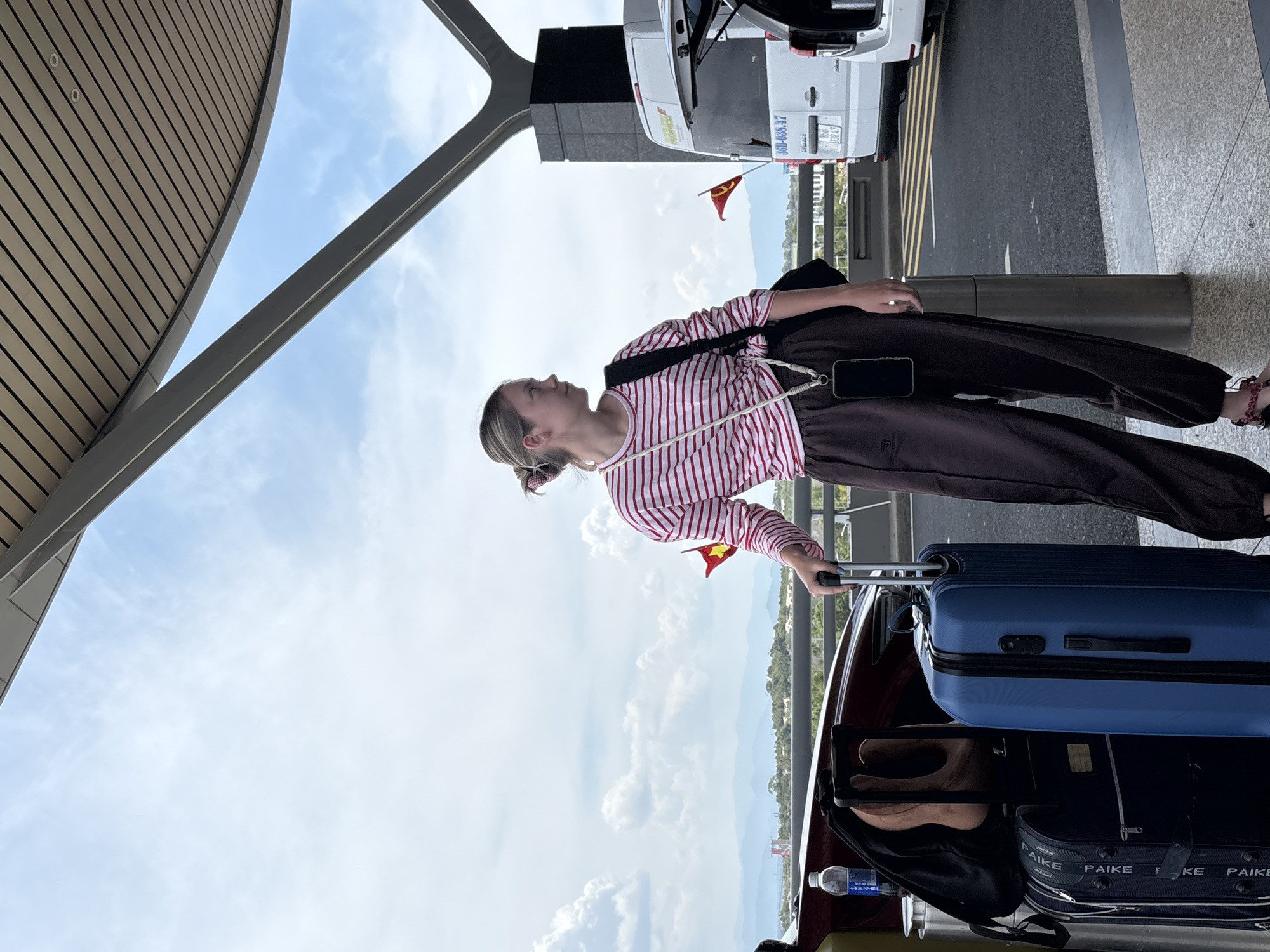Early morning travelers gather at Cam Ranh International Airport