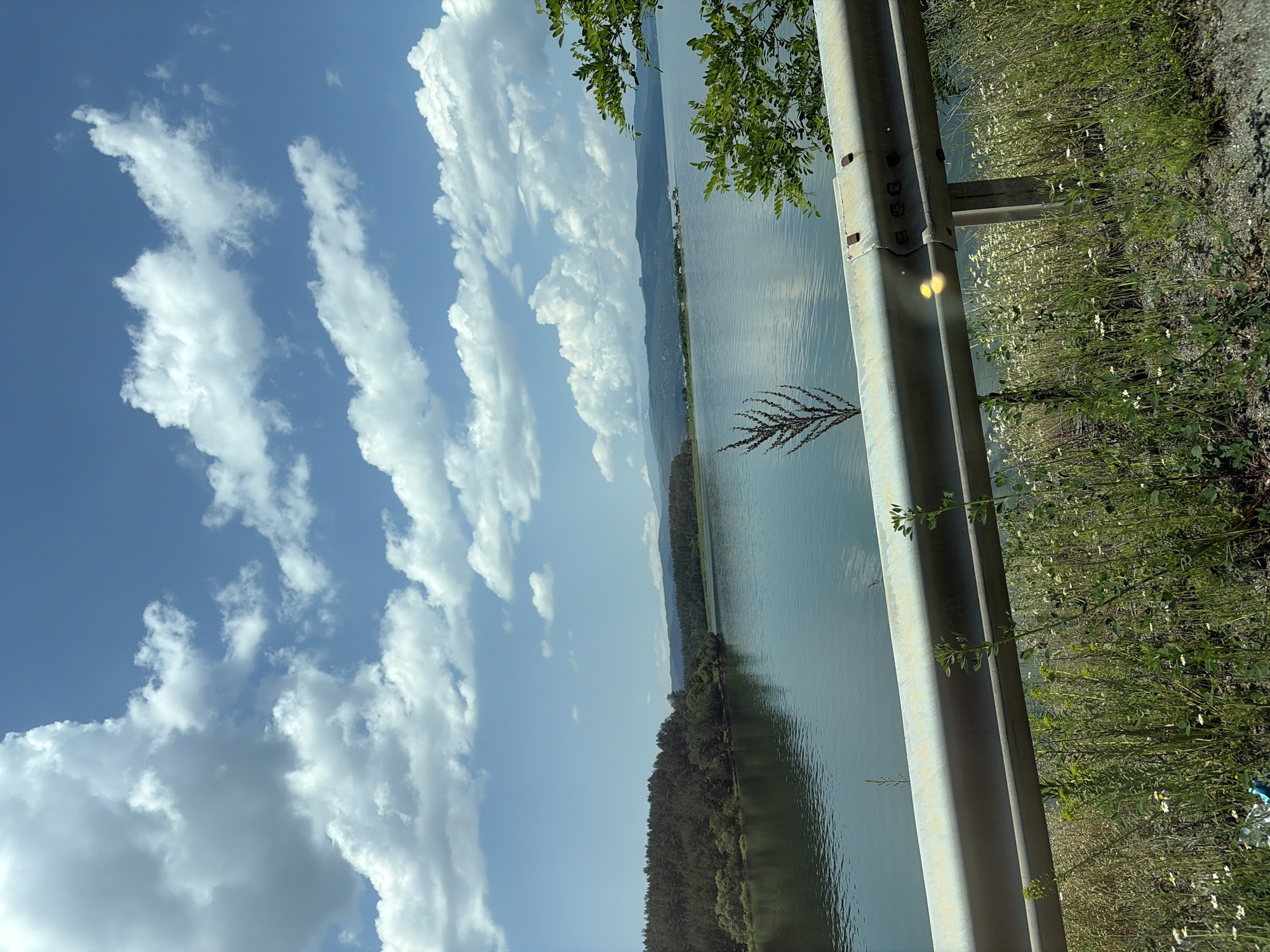 Witness documents scenic drive through forests and lakeside terrain