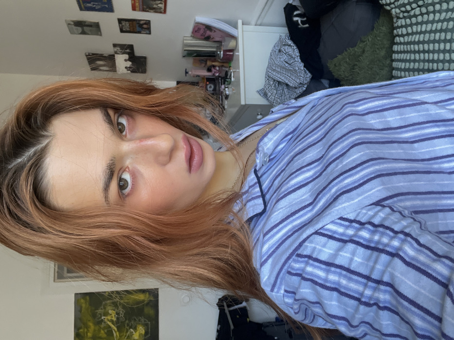 Woman documents extended indoor selfie session over two hours