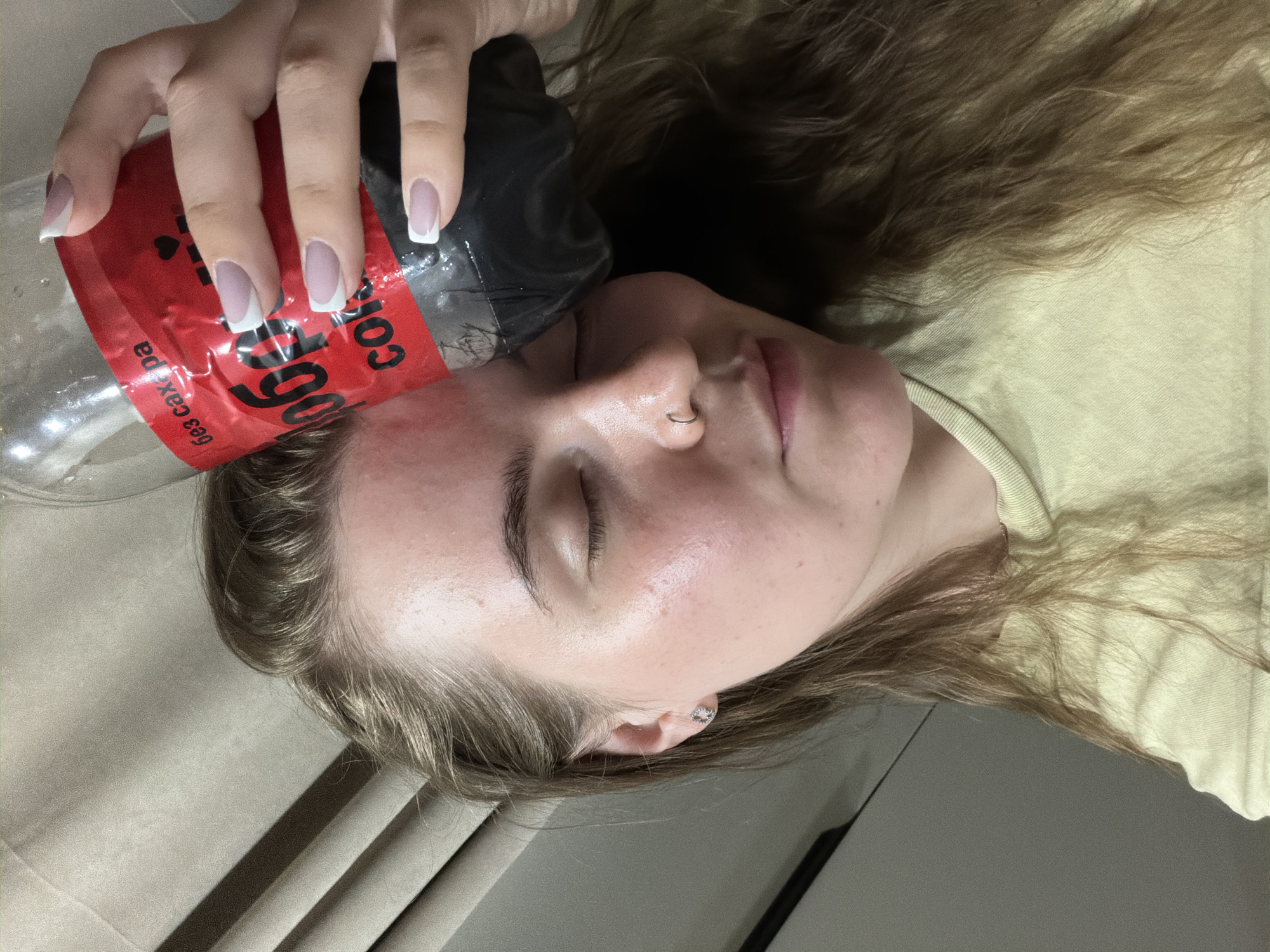 Woman photographed in casual indoor moments in Chaikovsky, Russia
