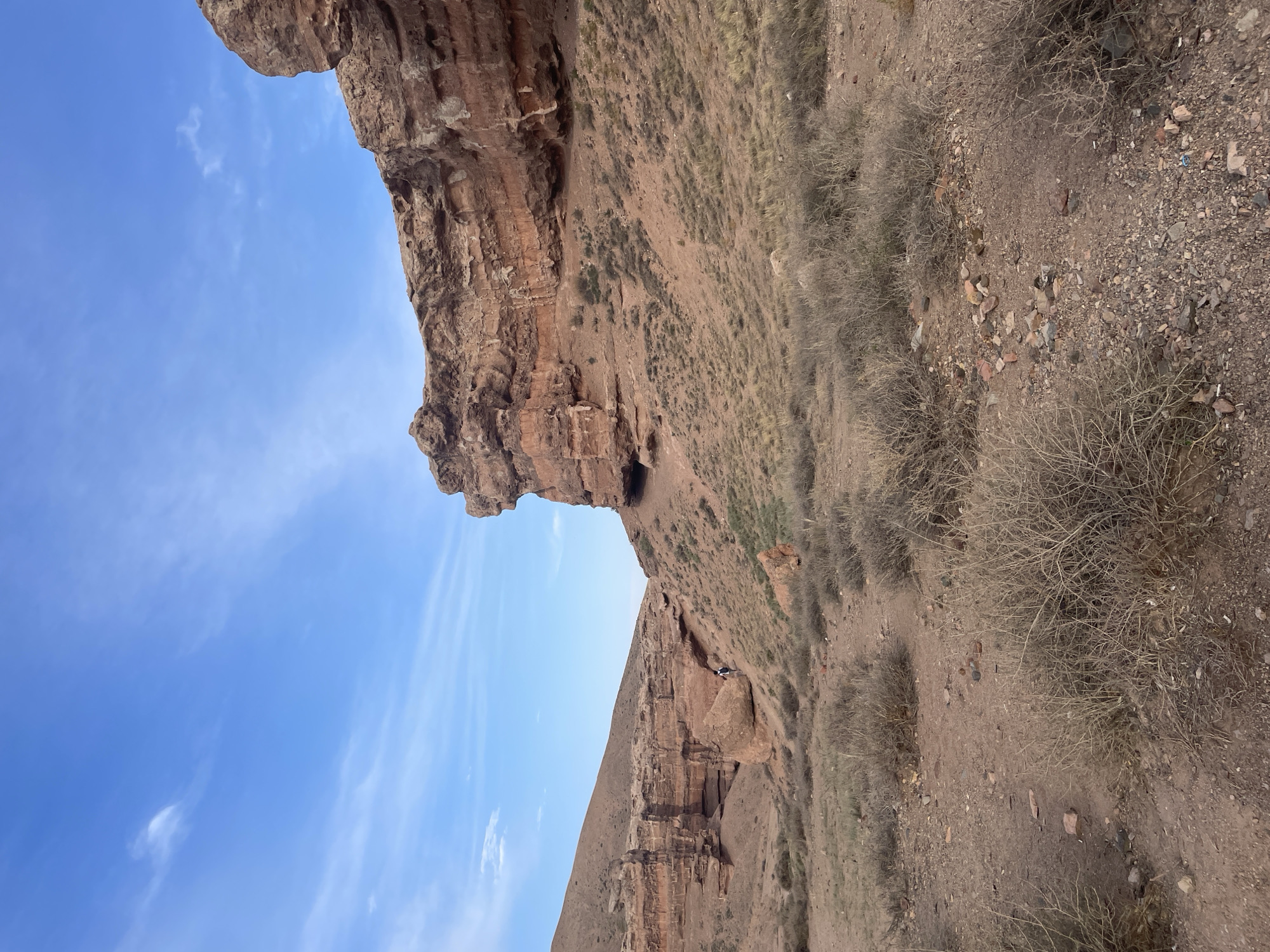Exploring Charyn Canyon's red rock formations in Kazakhstan
