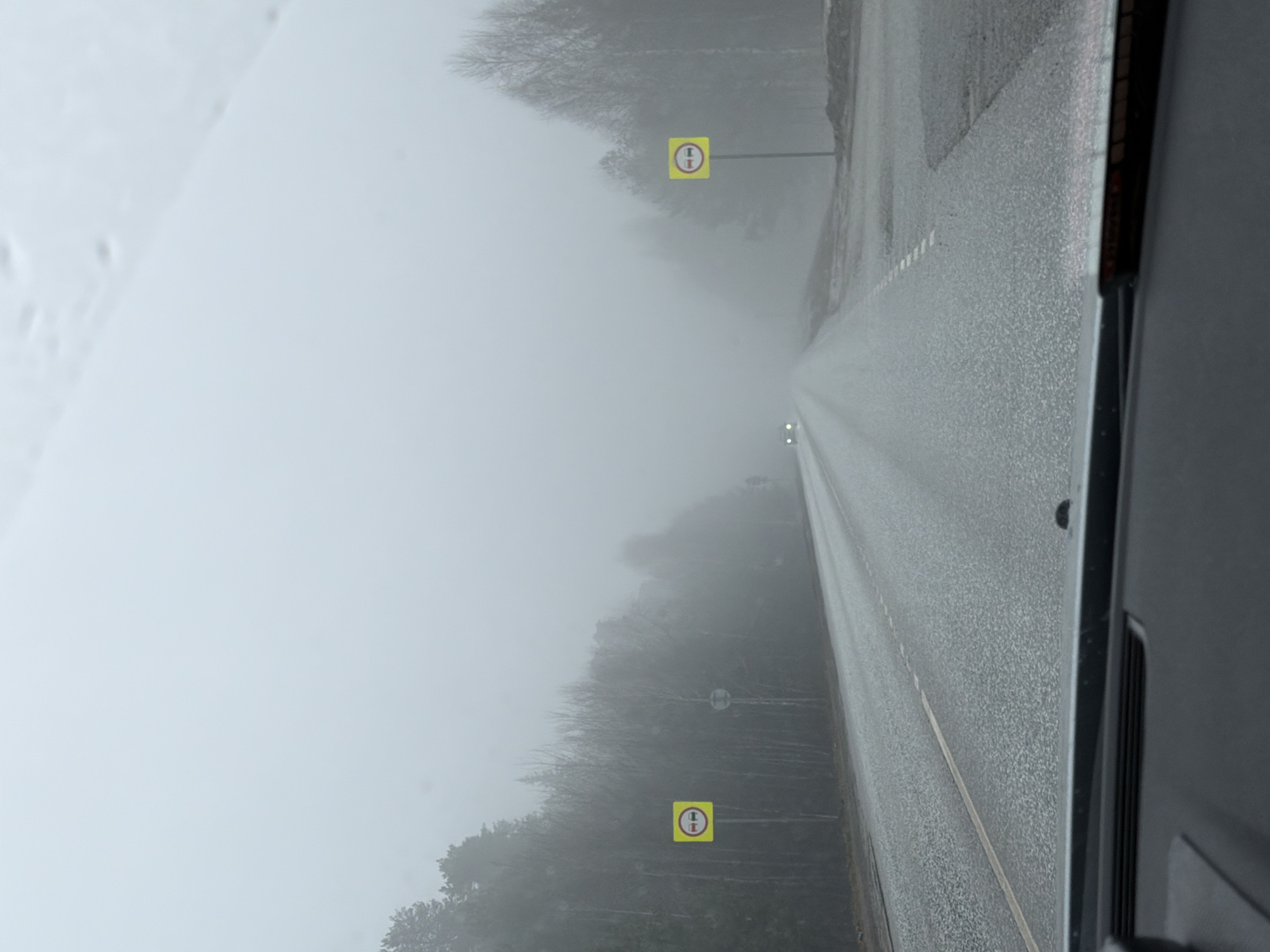Motorist drives through heavy fog, wet conditions near Chaikovsky