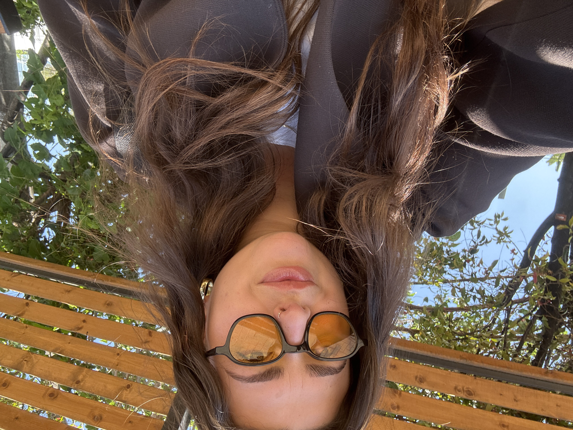 Woman poses for upside-down photo in Ramat HaSharon