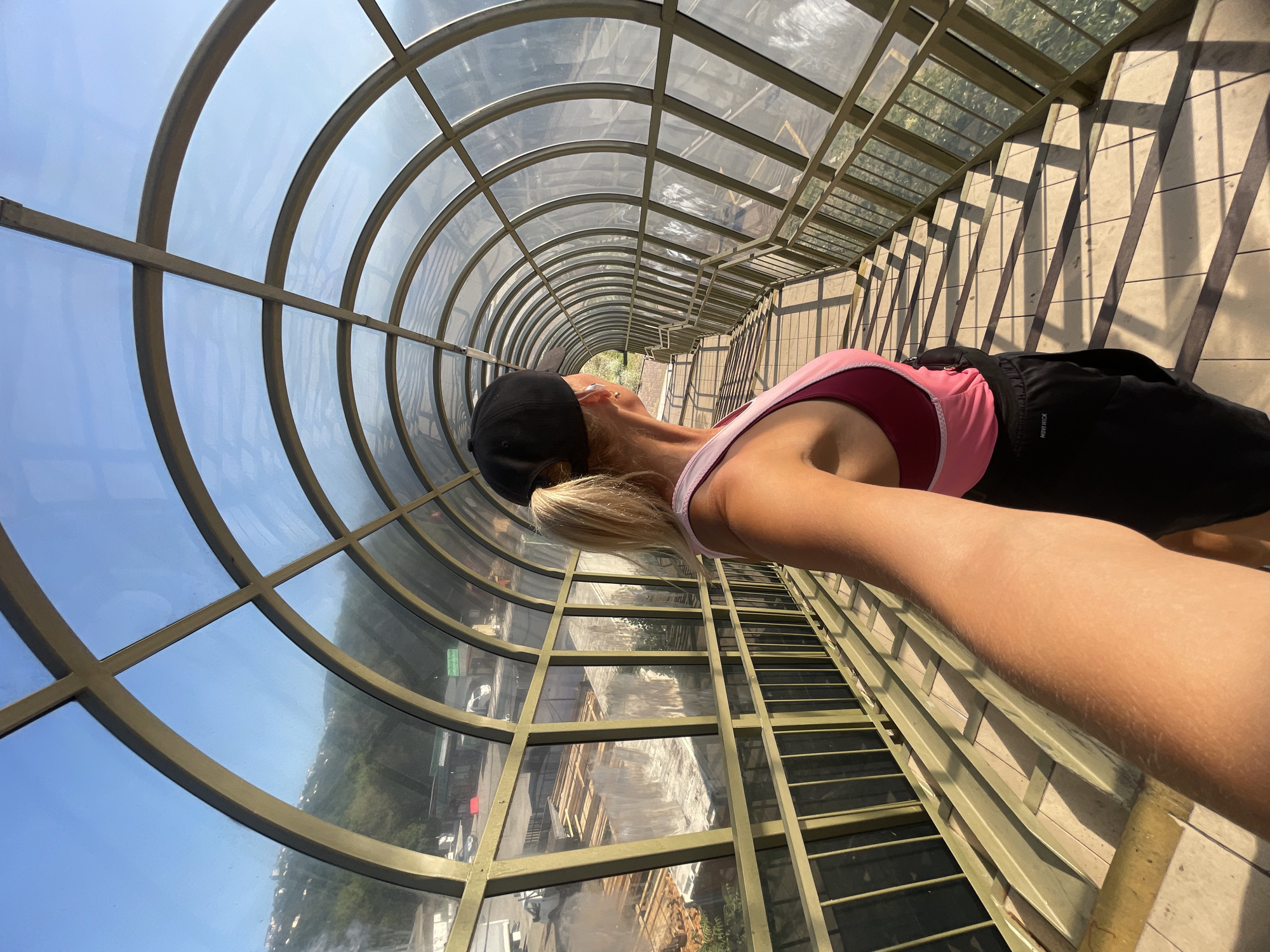 Quick stop on a glass-covered staircase bridge in Sochi