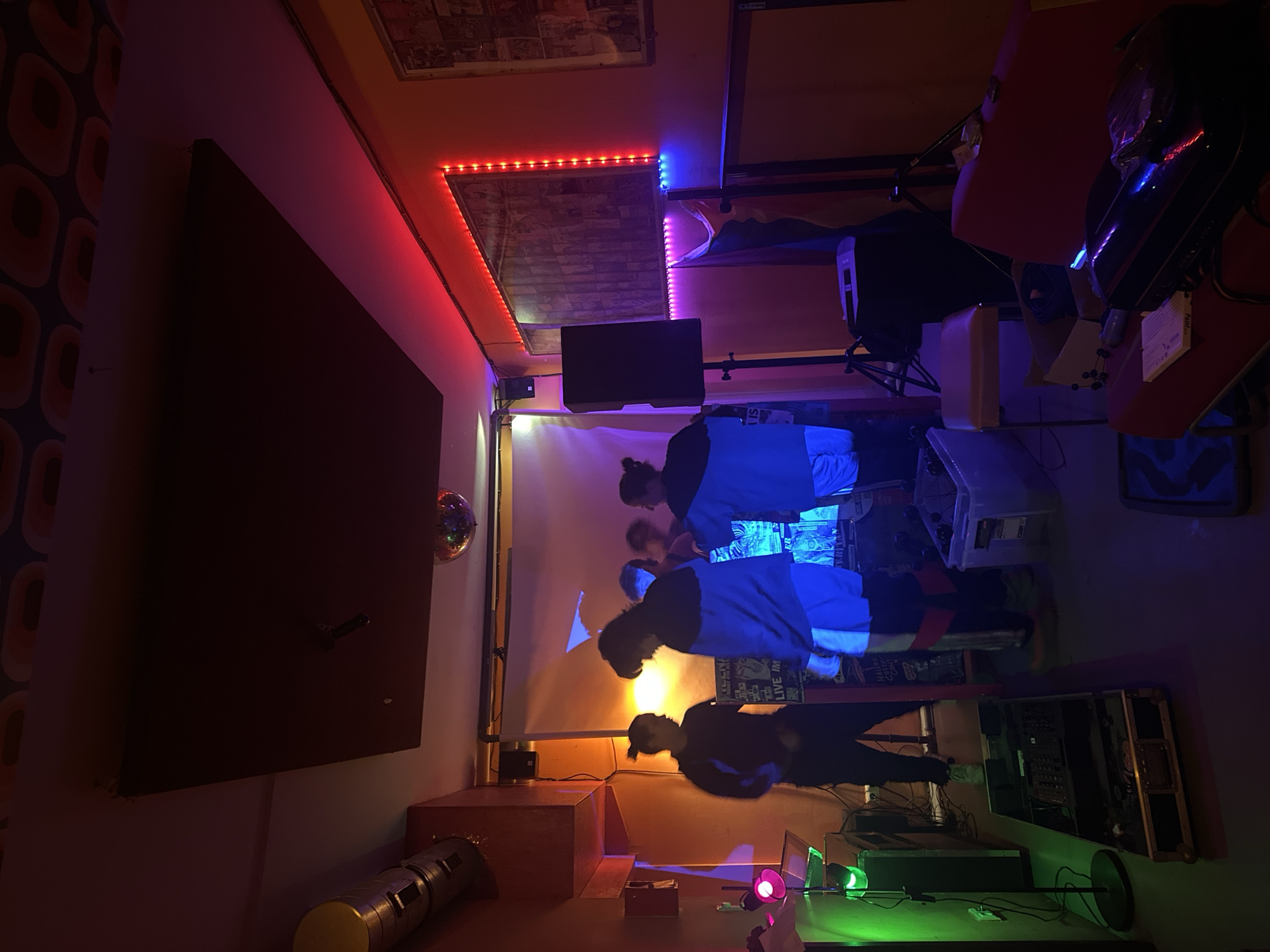 Berlin witnesses document indoor LED gathering, graffitied building exterior