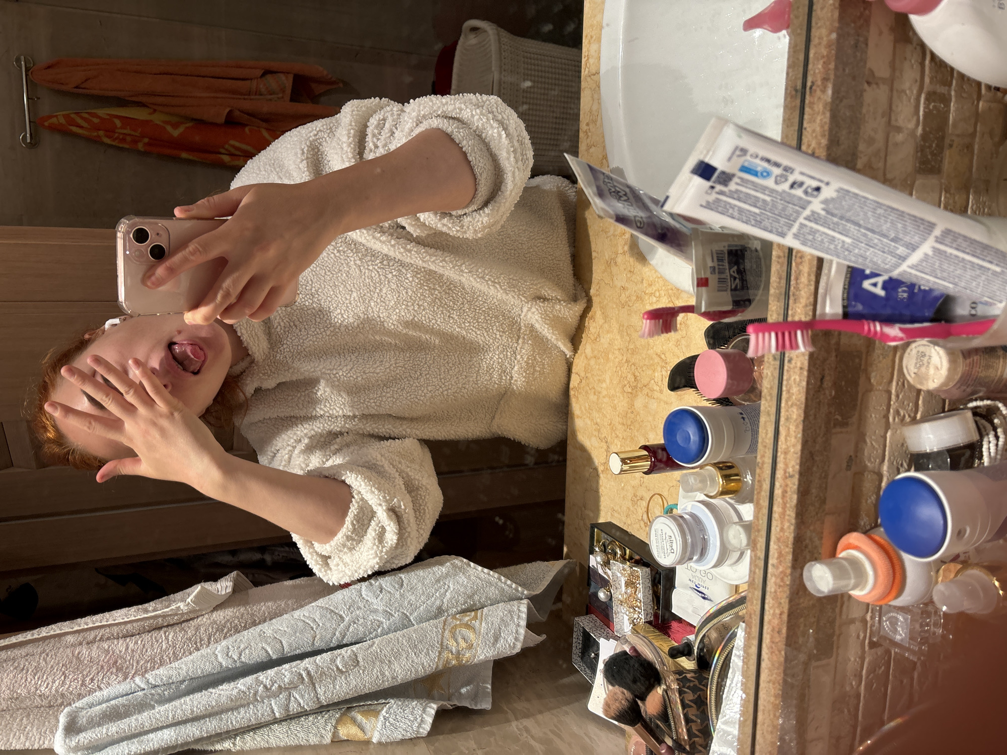 Woman documents evening routine in Budva apartment