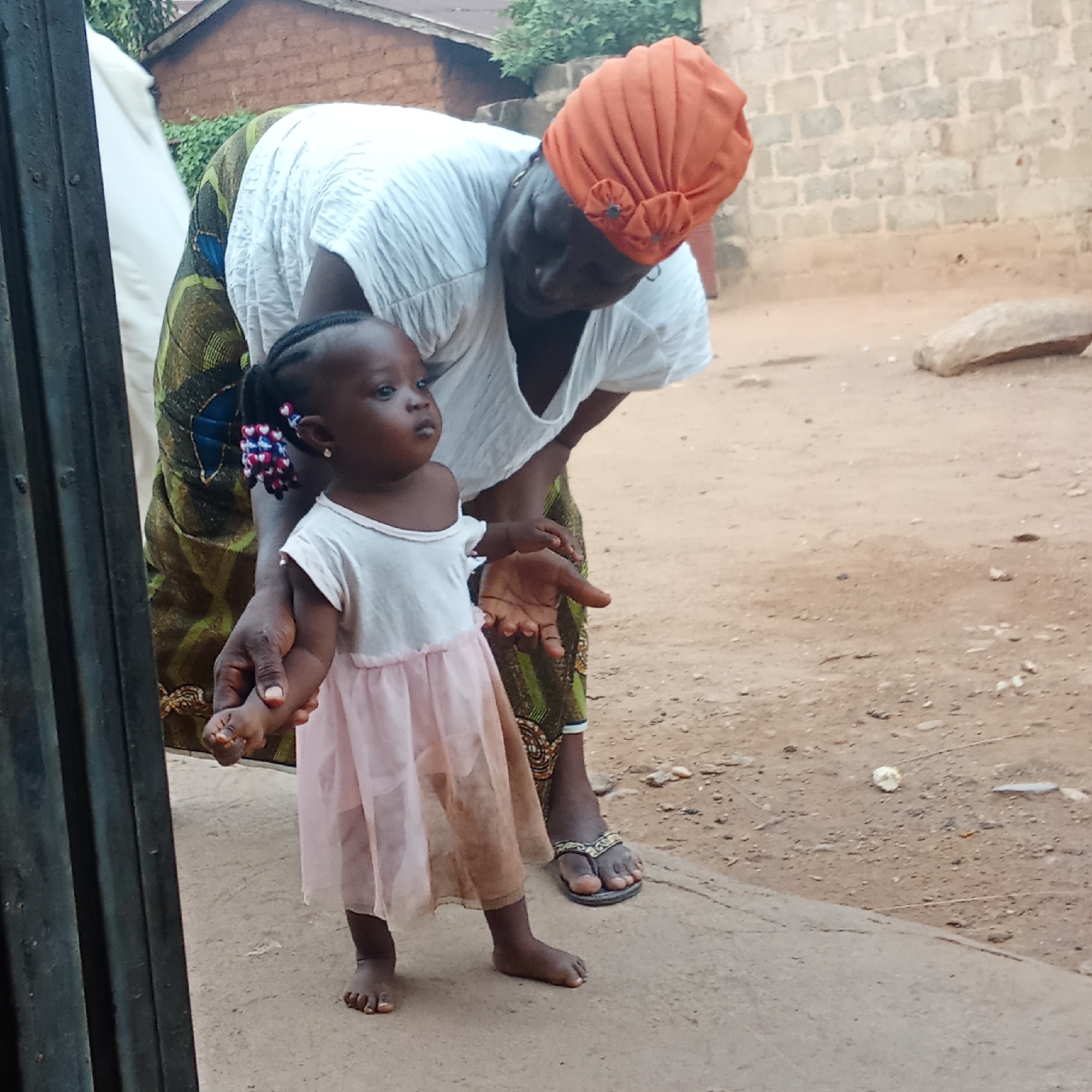 Woman and child observed in outdoor setting