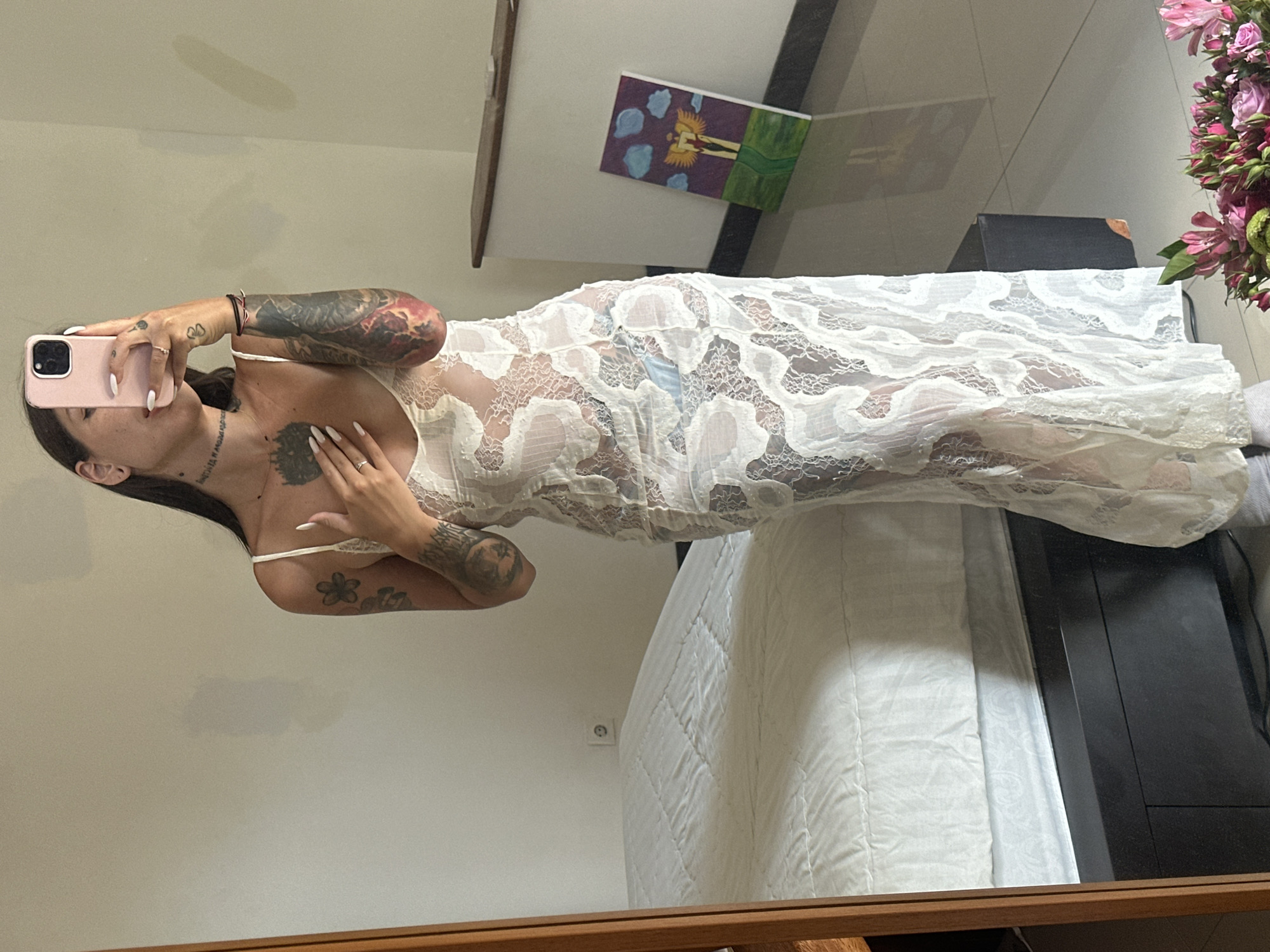 Tattoo-heavy mirror selfies from a North Kuta room, Bali