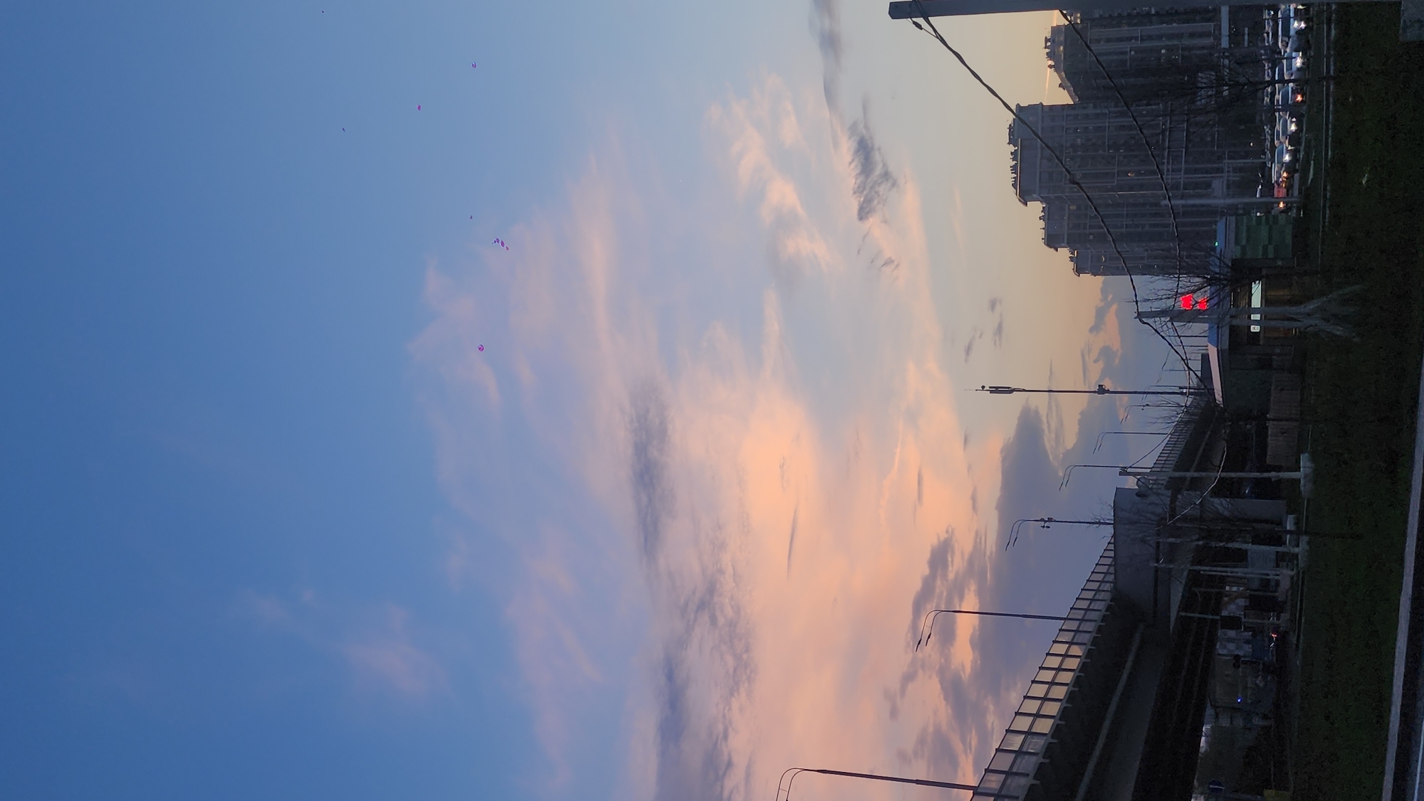 Moscow sunset observed over highway overpass and urban infrastructure