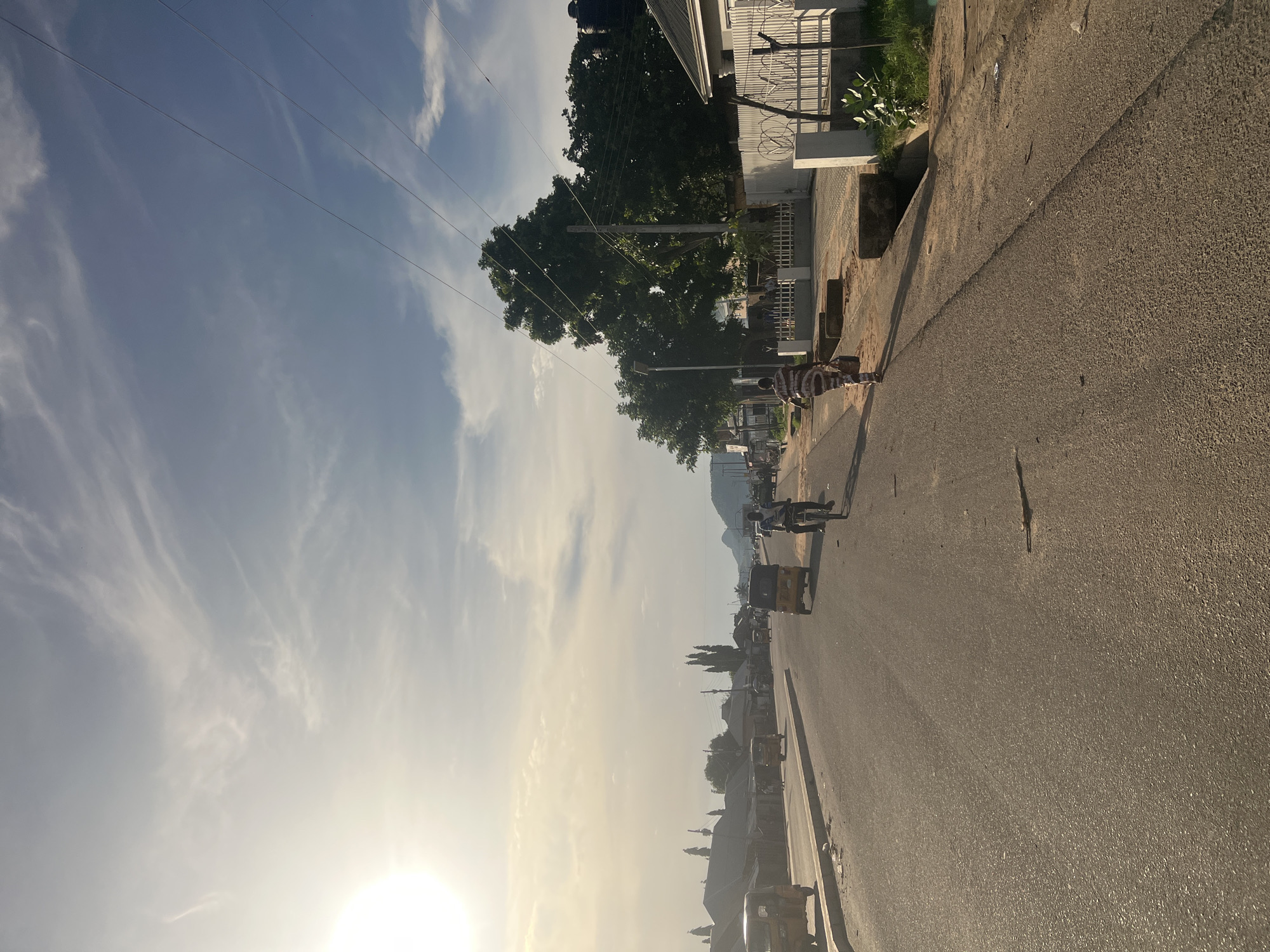 Afternoon sunlight illuminates streets and buildings in Jalingo, Nigeria