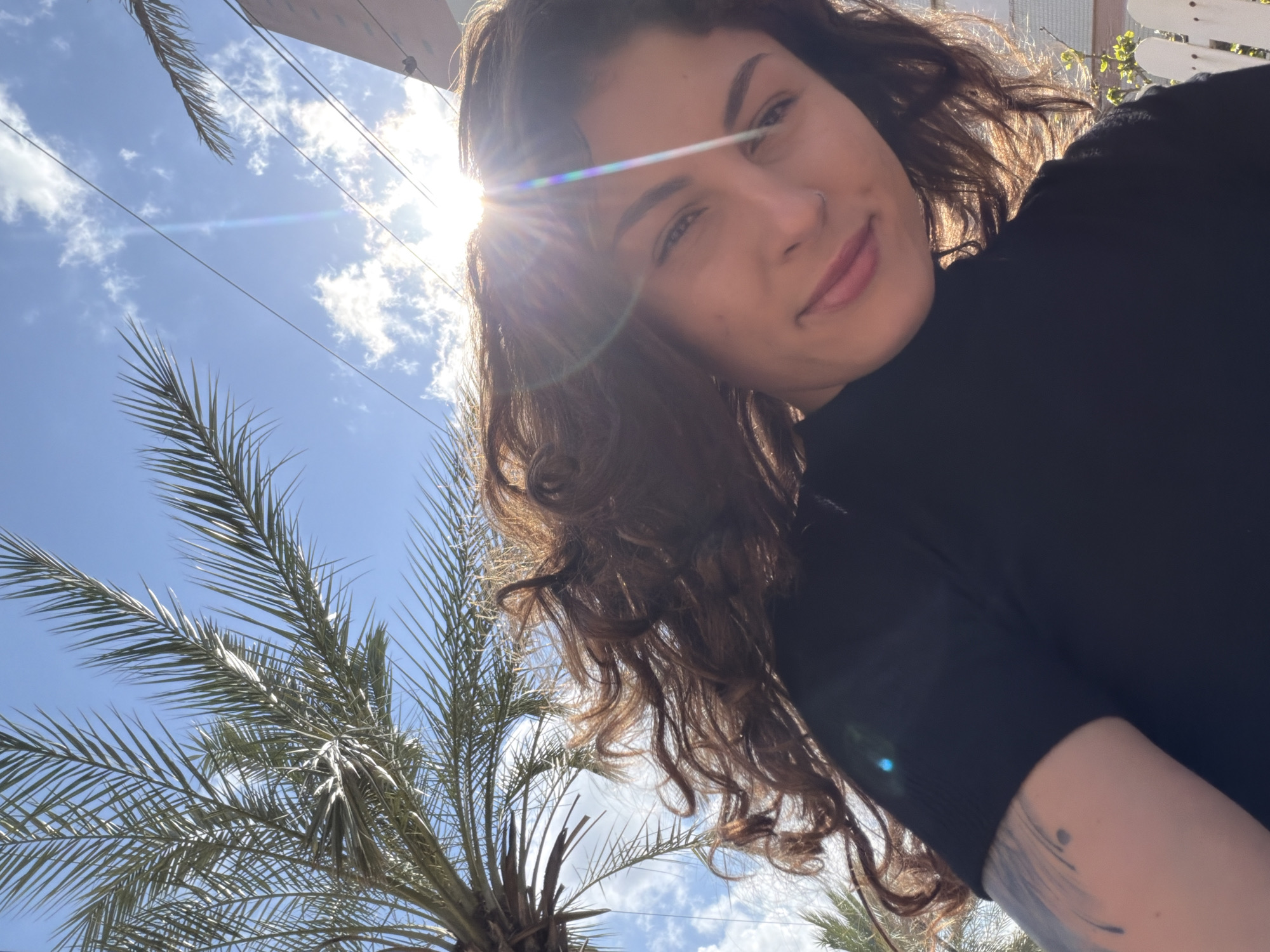 Woman photographed outdoors in Kiryat Bialik, Israel morning scene
