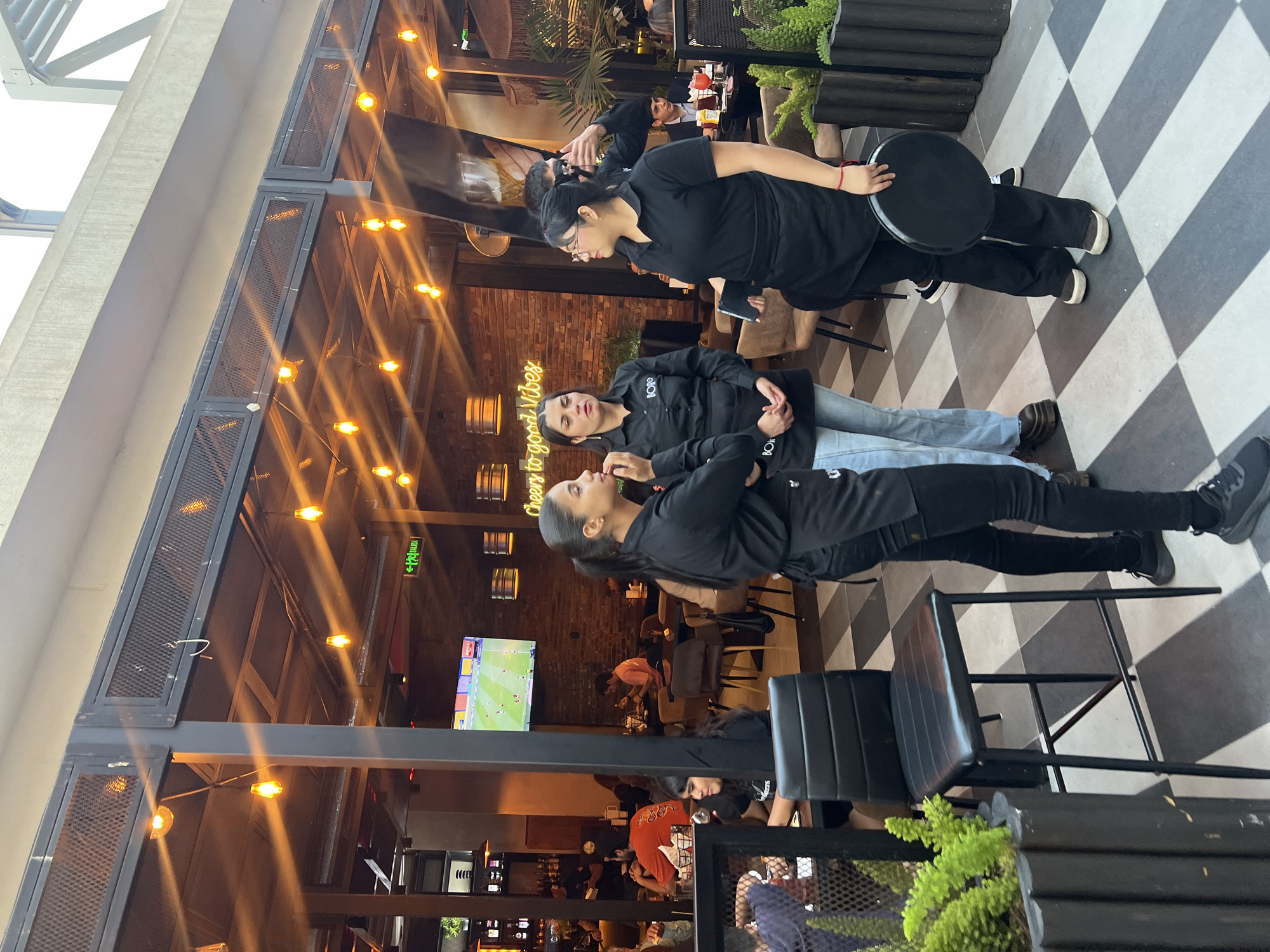 Evening dining scene captured at Raw Bar restaurant in Arica