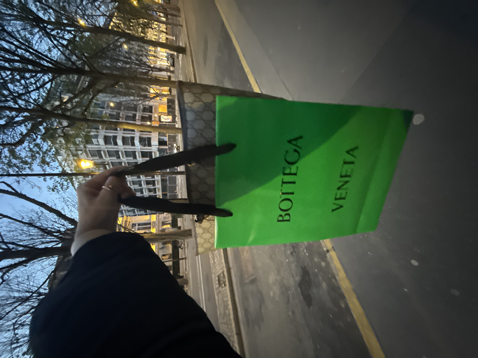 Evening luxury shopping documented on Paris's Avenue Montaigne