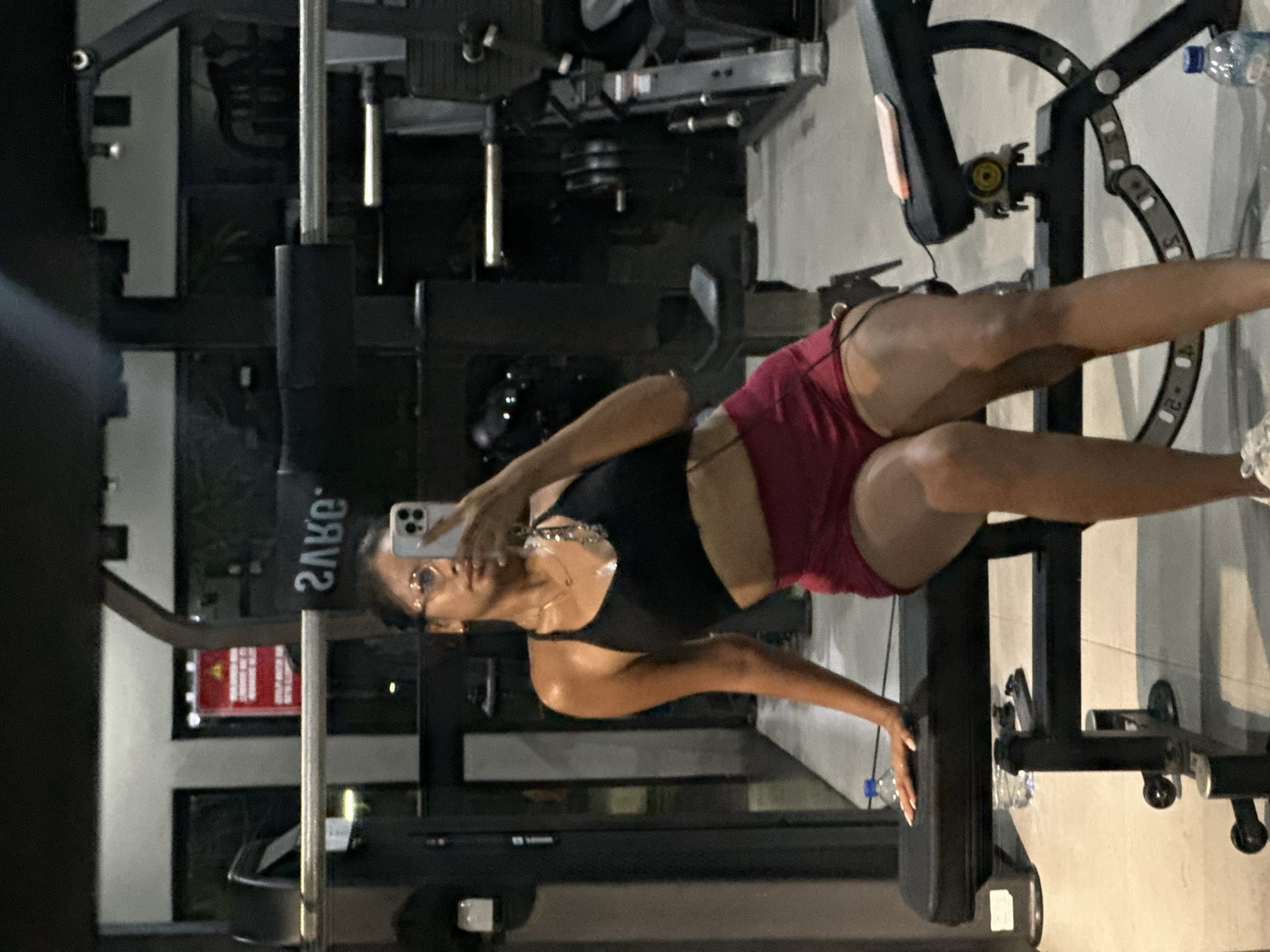 Woman takes gym selfies at Batubulan fitness center